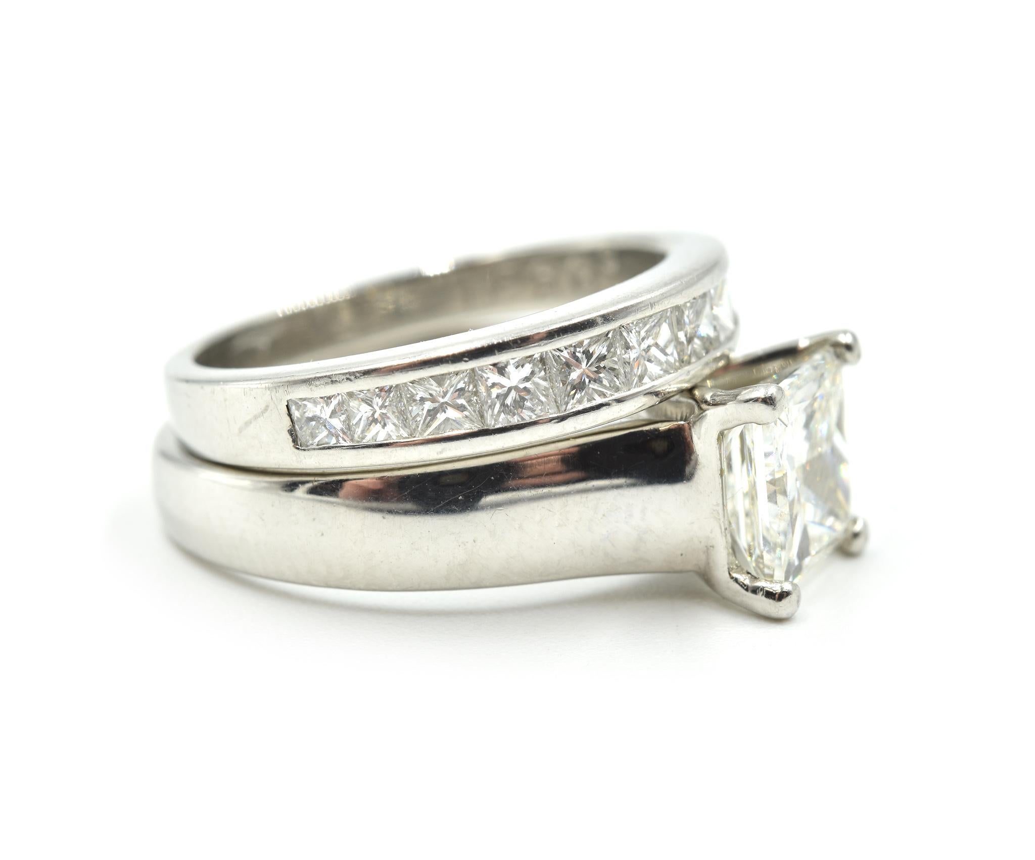 This wedding set features a princess cut center diamond in a sensational platinum mounting, with a stunning princess cut wedding band. The center princess cut diamond weighs 1.25 carats, and the diamond is graded I in color and VS1 in clarity. The