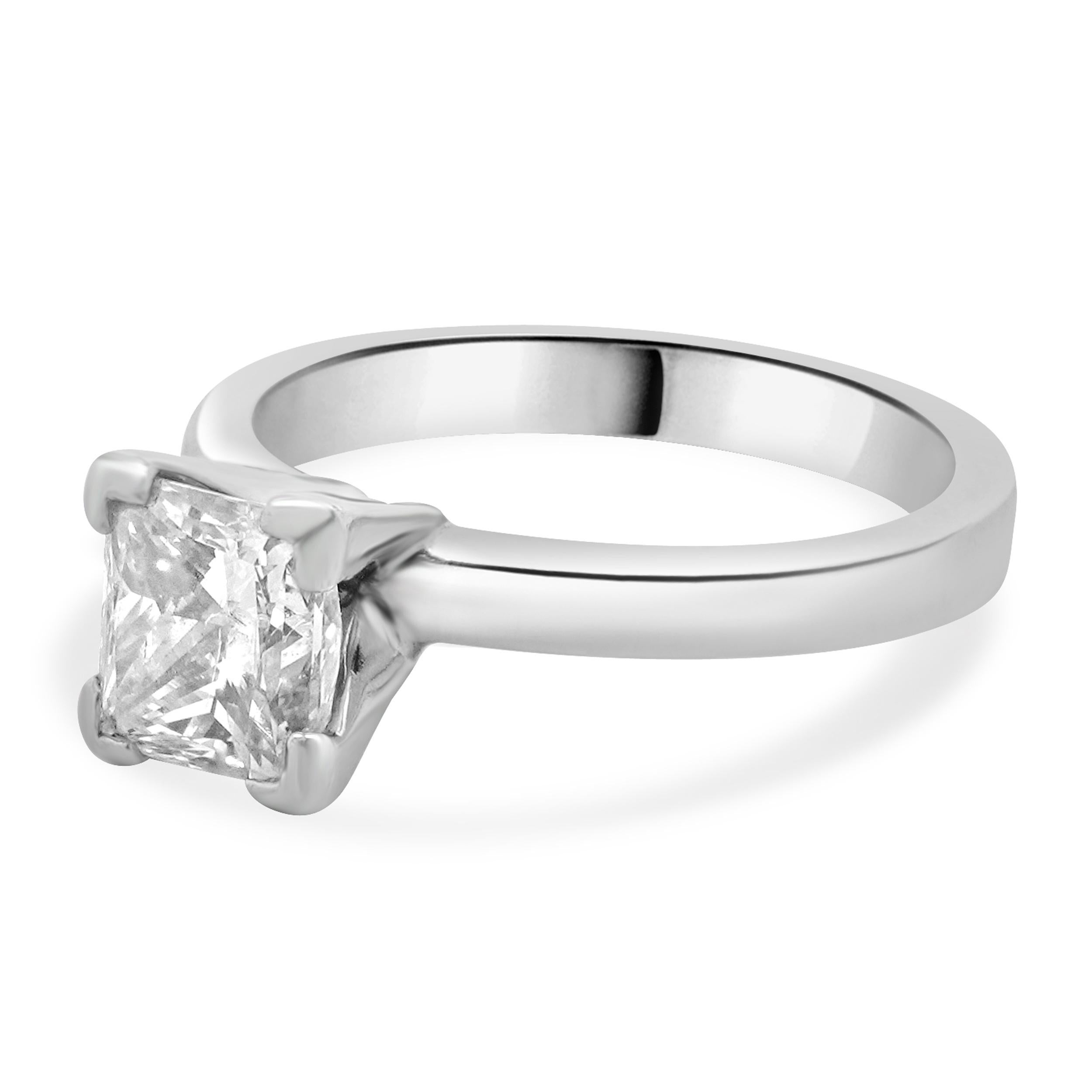 Designer: custom design
Material: platinum
Center Diamond: 1 princess cut = 1.16ct
Color : J
Clarity : SI3
Dimensions: ring top measures 7mm
Size: 4.75 complimentary sizing available 
Weight: 4.80 grams
