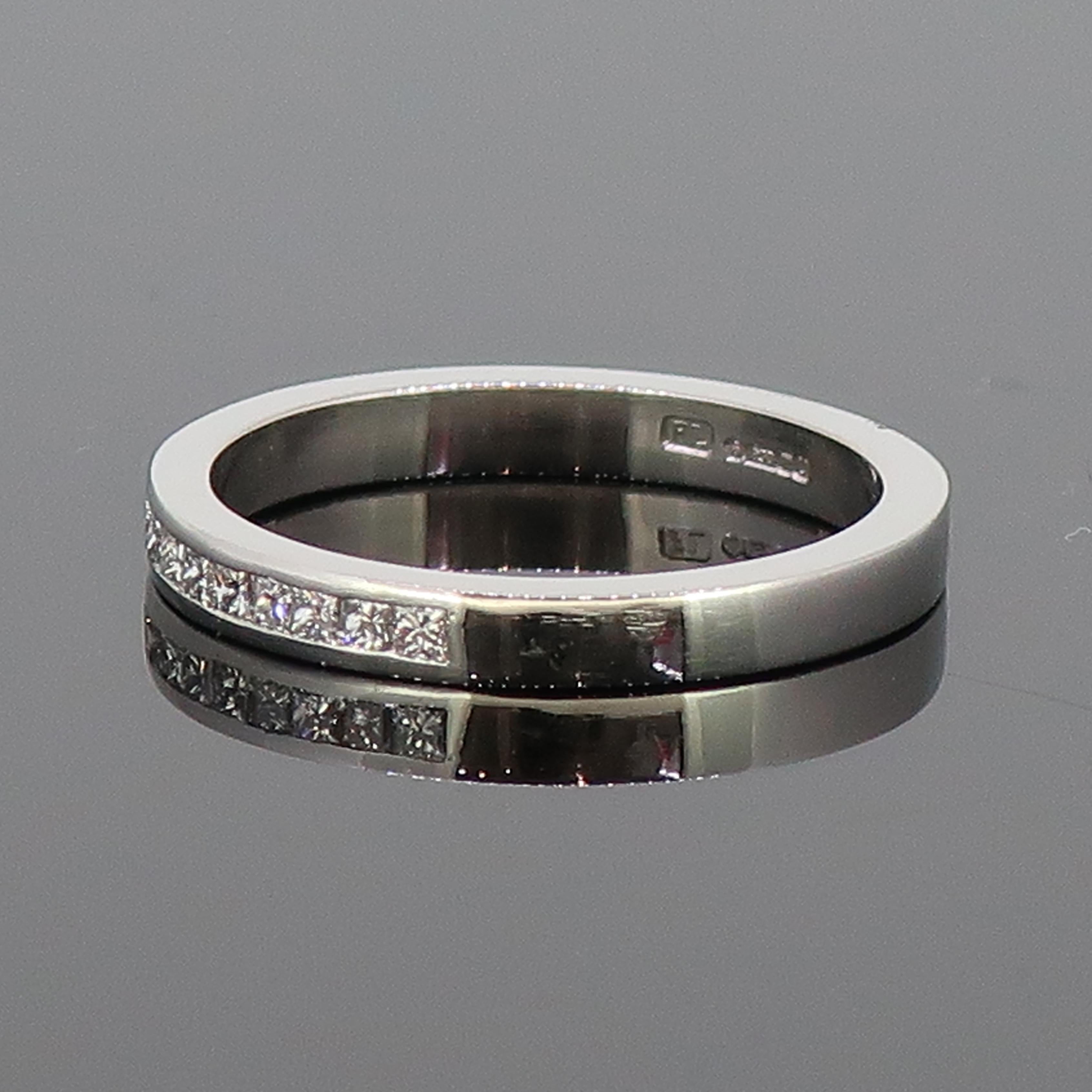 Modern Platinum Princess Cut Diamond Eternity Band Ring For Sale