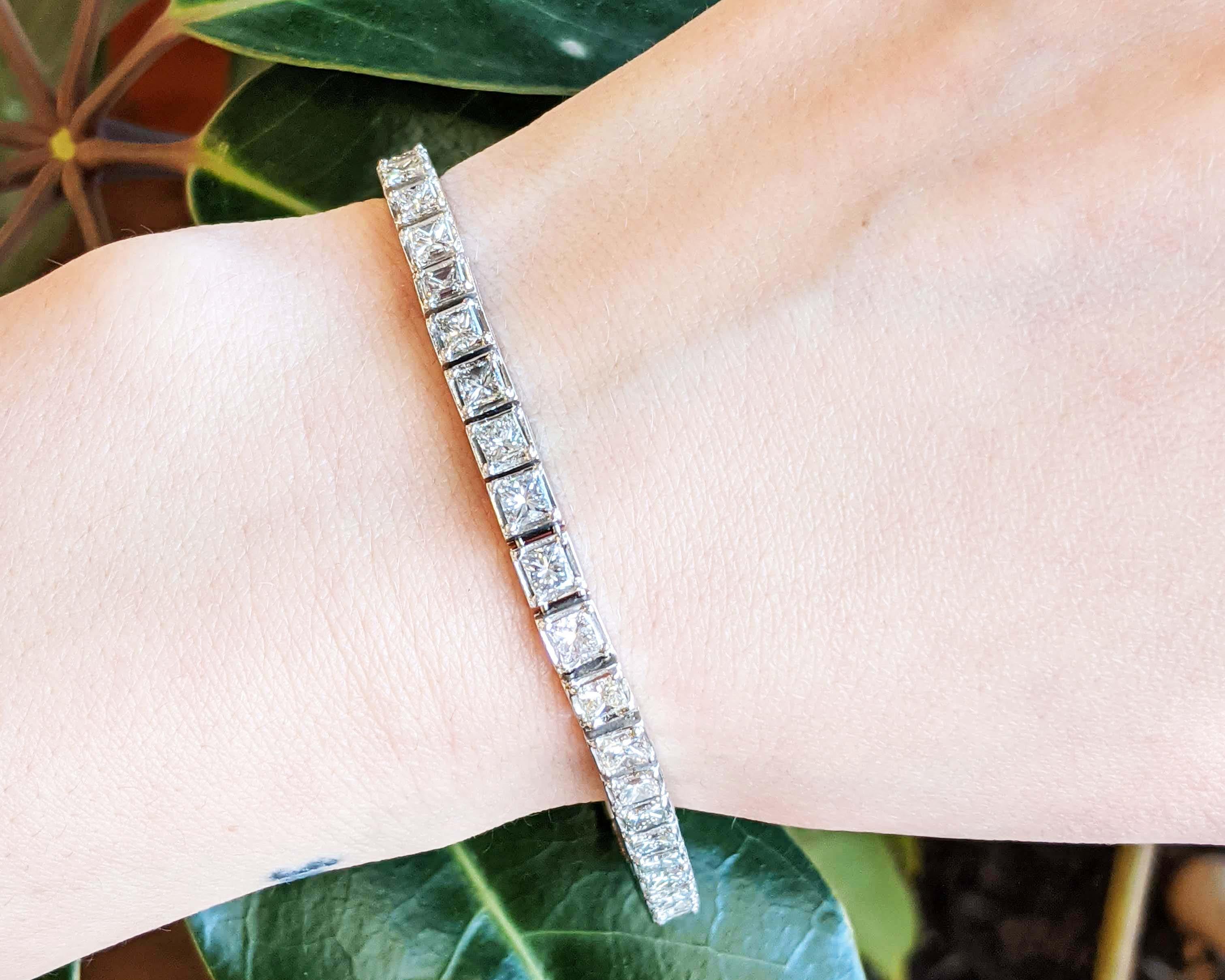 This is an elegant diamond line bracelet in bright white platinum featuring brilliant white princess cut diamonds! This bracelet takes the classic line bracelet look and adds a sparkly spin by using 39 stunning princess cut diamonds. This bracelet