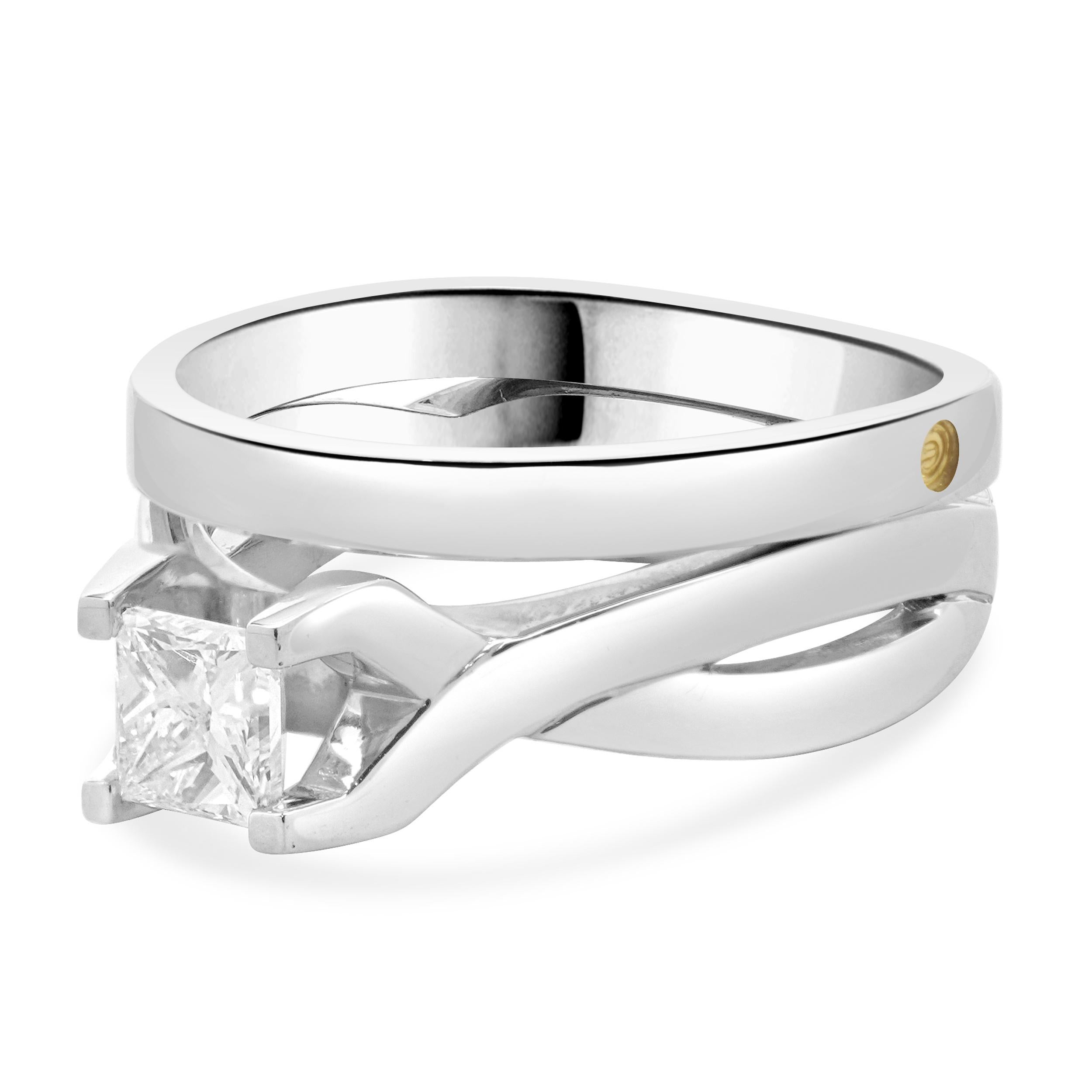Designer: custom
Material: platinum
Diamond: 1 princess cut = 1.01ct
Color: G
Clarity: VS2
Dimensions: ring top measures 9mm wide
Ring Size: 9.25 (complimentary sizing available)
Weight: 21.38 grams
