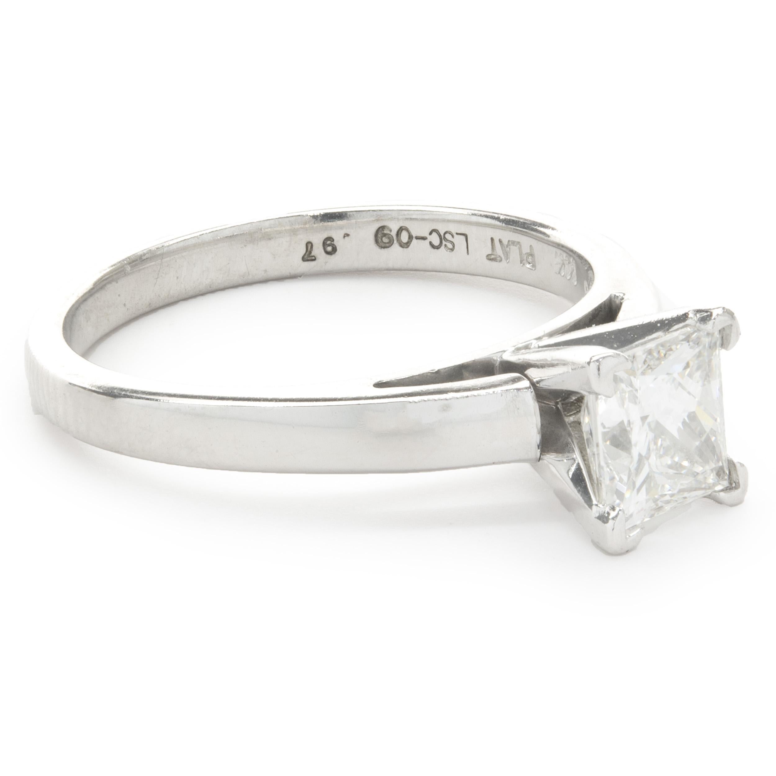 Designer: custom
Material: platinum
Diamond: 1 princess cut = 0.97ct
Color: G
Clarity: SI1
GSI Certification: 107736S
Ring Size: 7 (please allow two additional shipping days for sizing requests)
Dimensions: ring top measures 5.7mm 
Weight: 4.23 grams