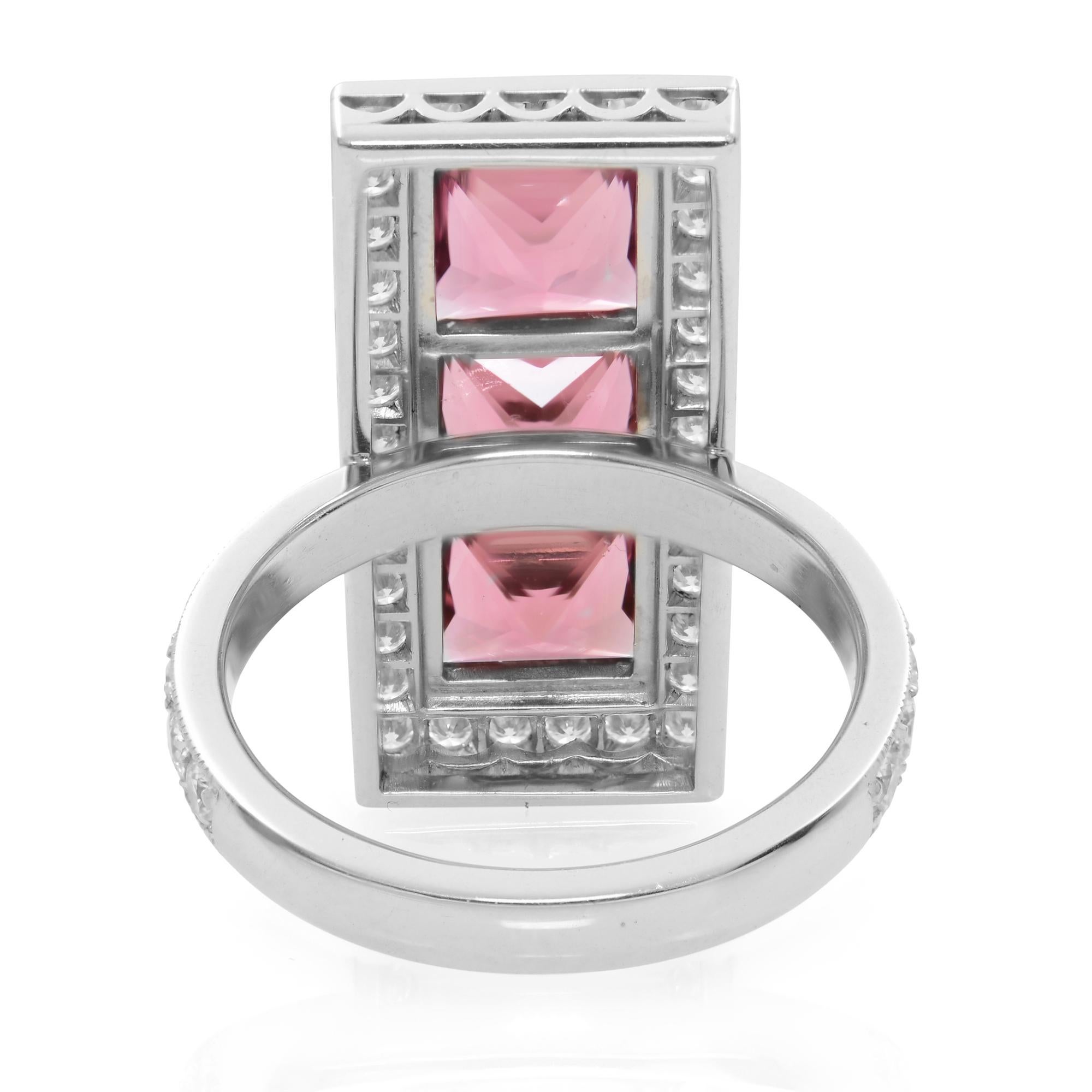 Platinum Princess Cut Pink Tourmaline Three Stone Diamonds Halo Ring In New Condition For Sale In New York, NY