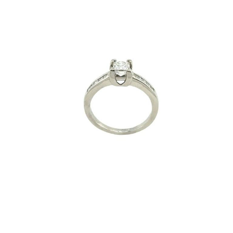 Palladium Princess Cut Solitaire Diamond 0.50ct G/SI2 Natural Diamond Ring Set with 5 Princess Cut Diamonds On Each Shoulder Total Diamond Weight 0.75ct with Diamond Grading Report.

Additional Information:
Total Diamond Weight: 0.50ct +