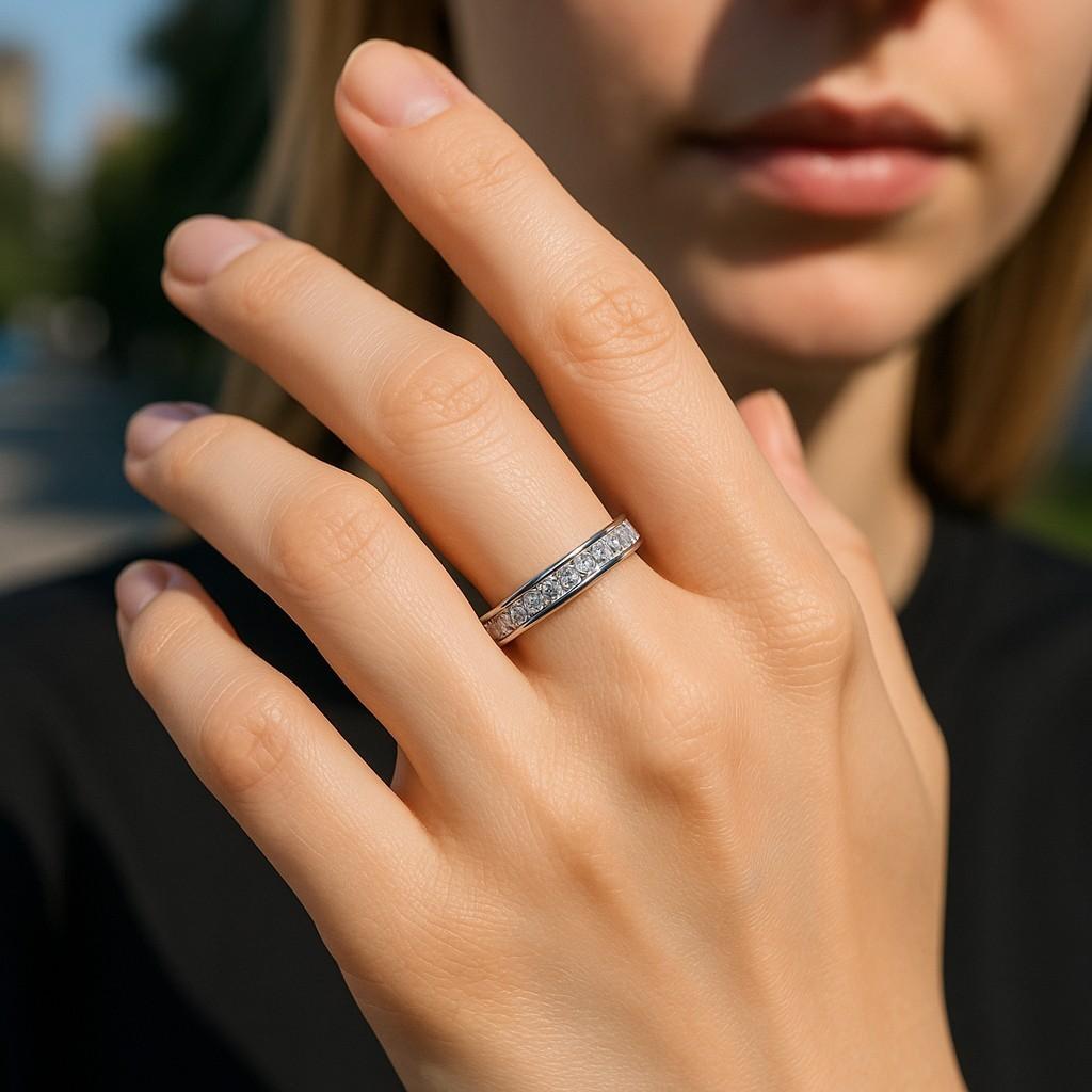 Introducing our exquisite Platinum Princess Diamond Eternity Wedding Band, a timeless symbol of eternal love and commitment. Crafted with the utmost precision and artistry, this magnificent piece features a stunning array of perfectly cut