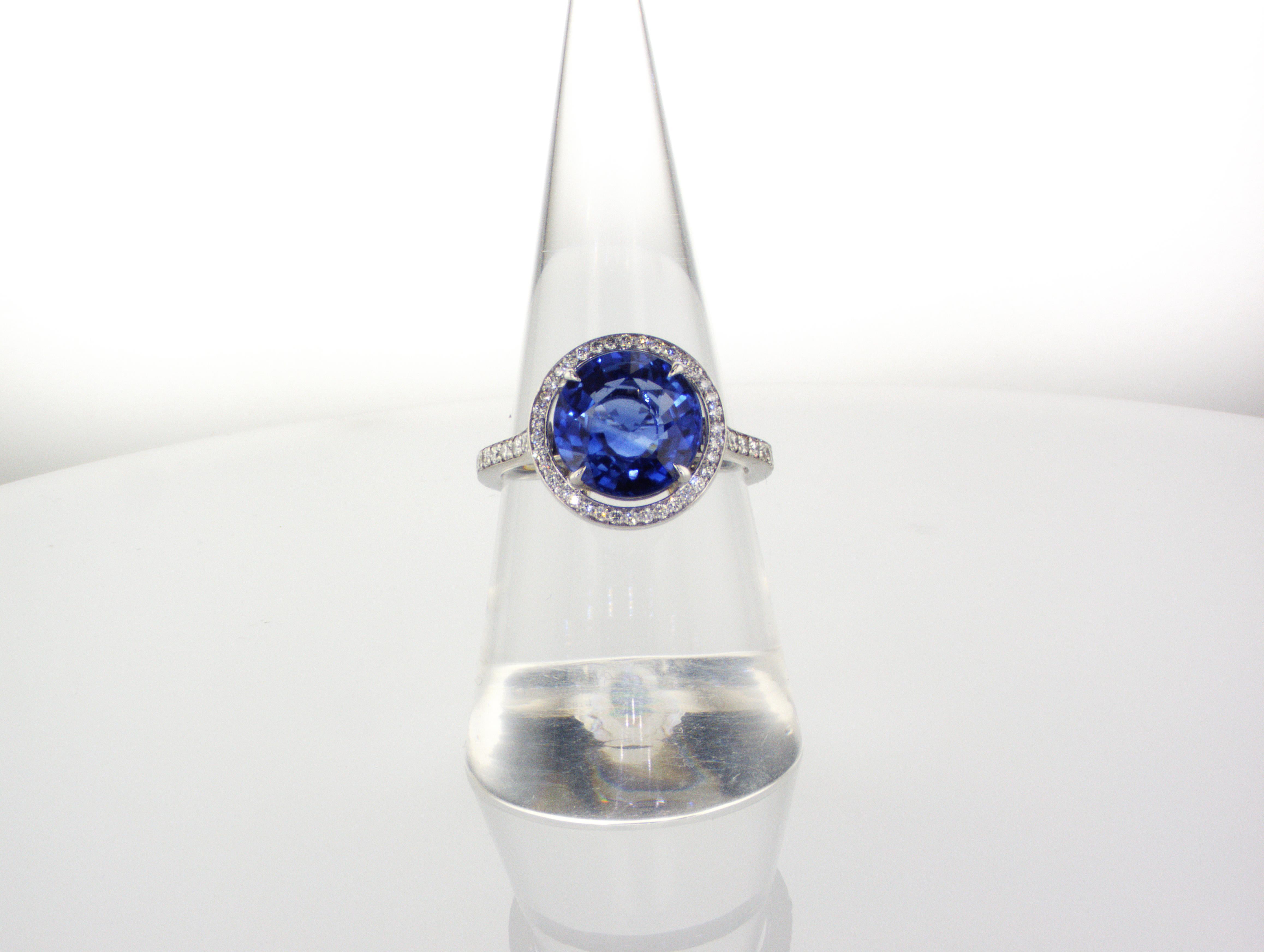 Platinum Diamond Ring with 4.20 ct Round Vivid Blue (Royal Blue) Sapphire and 0.28 ct Diamonds. This World Class magnificent Sapphire can attract the attention of any person. The ring is set in PT950 (prongs white gold 18 CT) and diamonds. Certified