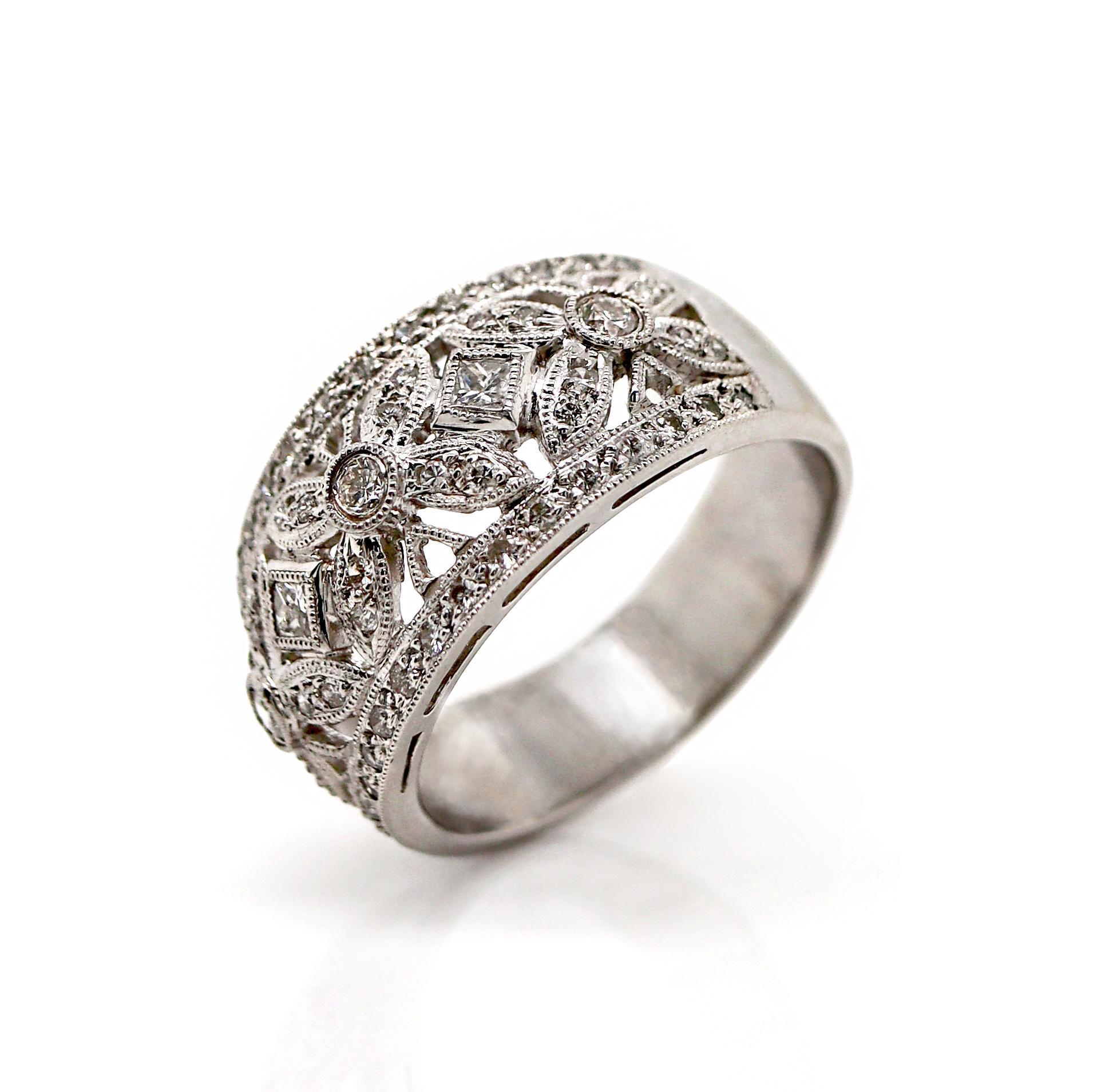 Platinum Pt900 Diamond Filigree Ring

A stunning platinum filigree ring that exudes elegance and sophistication. This delicate texturing creates a vintage charm, giving it a refined, artisanal feel, making it a breathtaking piece that captures