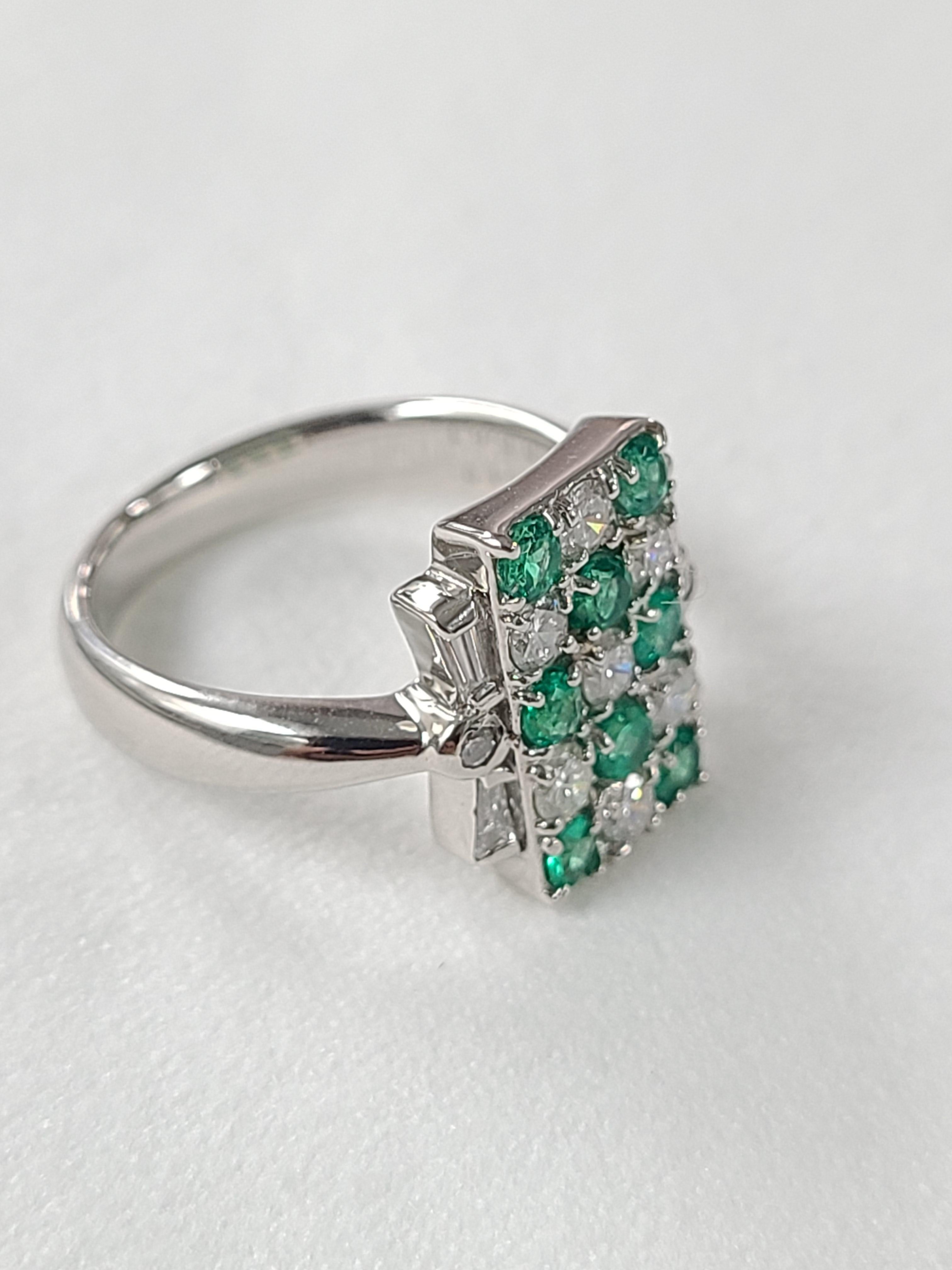 A beautiful and chic Natural emerald and Diamond ring made in Platinum PT900 . This gorgeous ring has a emerald weight of .50 carats and diamond weight of .61 carats . The gross weight of the ring is 9.6 grams . The ring dimensions in cm 1.4 x 1.1 x