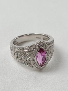 Platinum PT900 Pink Sapphire Ring with Diamonds