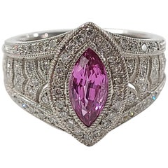 Platinum PT900 Pink Sapphire Ring with Diamonds