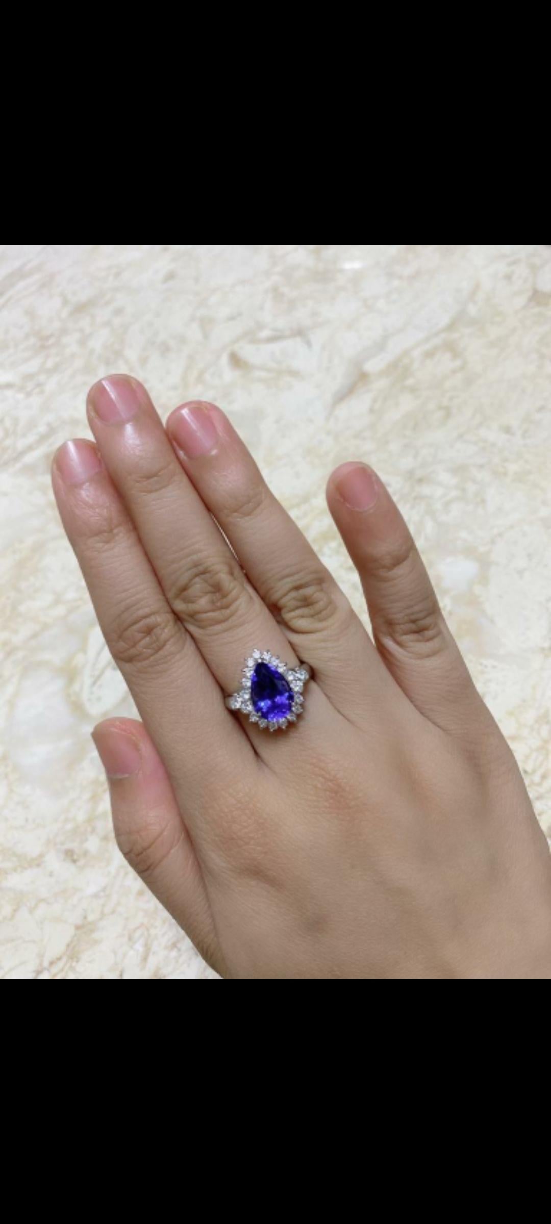 A beautiful and Elegant Tanzanite ring set in platinum PT900 with diamonds . The tanzanite weight is 3.00 carats and diamond weight is .70 carats in the ring. The ring dimensions in cm 1.5 x 1.5 x 2.5 (LXWXH). US size 7