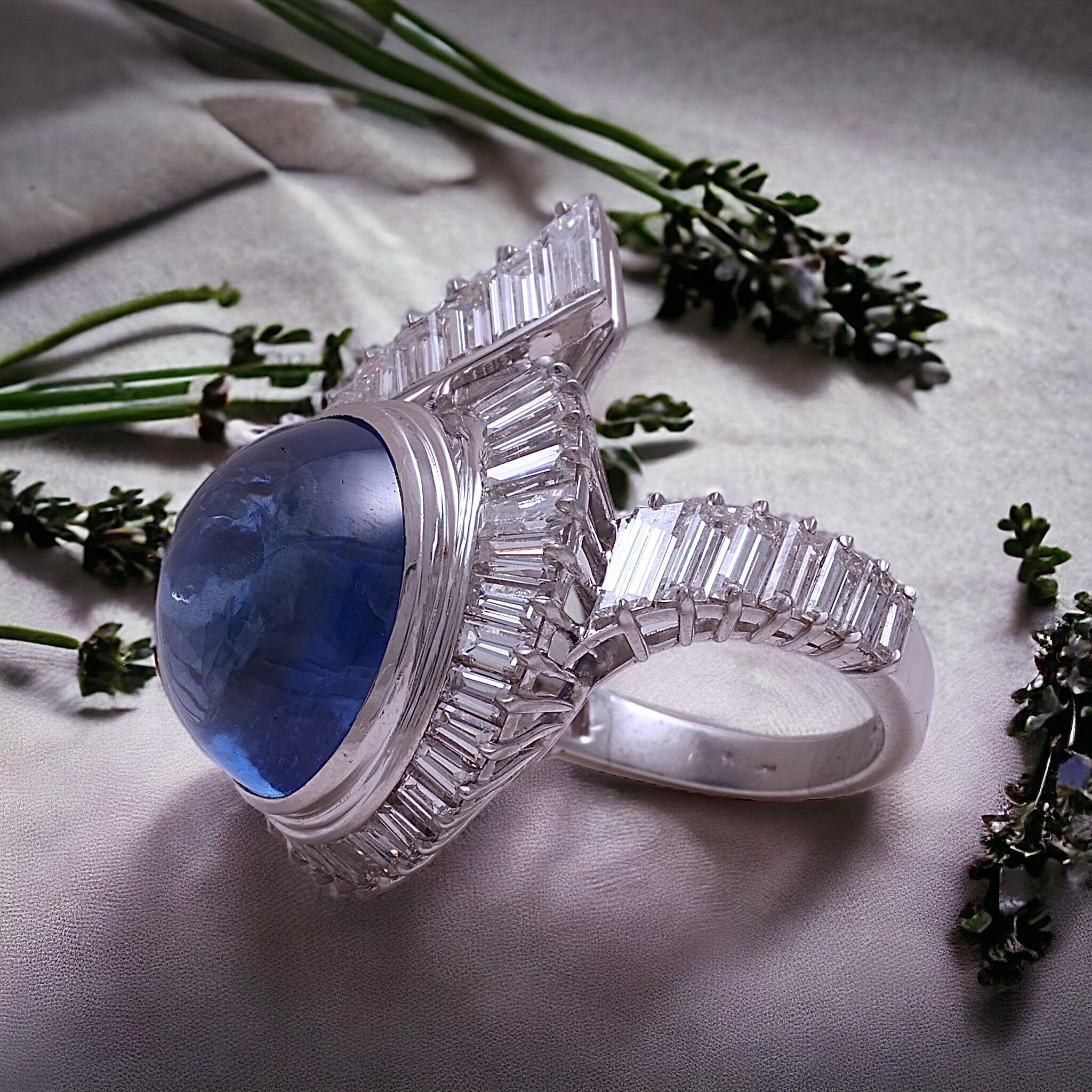 Beautiful Platinum Ring with No Heat Ceylon Blue Sapphire 14.6 ct. and Baguette Diamonds 3.15 ct from Estate Sultan Of Oman Qaboos Bin Said

Sapphire: Natural No Heat blue sapphire, cabochon cut, oval shape, Sri Lanka Origin, 14.6 ct.
Comes with GRS