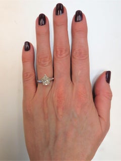 Platinum Ring  Prong Set With Pear Shape Diamond Weighing 2.02cts and Baguettes
