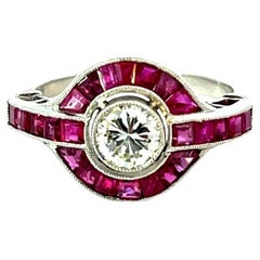Platinum Ring with 0.55 Carat Diamond and 3.32 Carats of Rubies