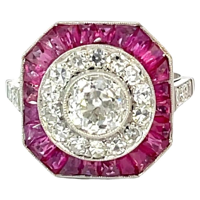Anello in platino con diamante taglio Brilliante 0,98ct, accenti di diamanti e rubini