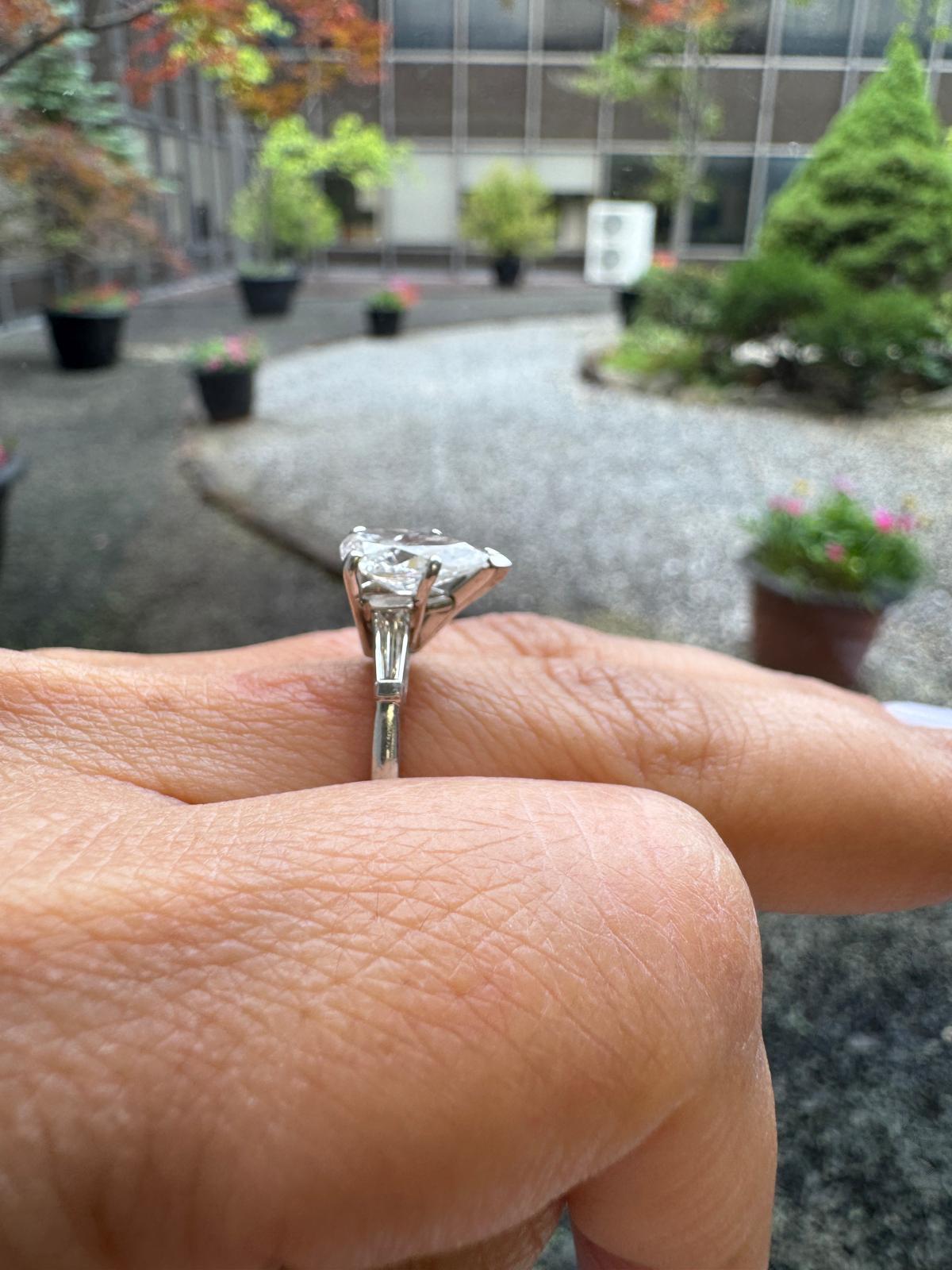 Platinum Ring with 1.60 Carat Pear-Shaped Diamond and Baguette Accents For Sale 5