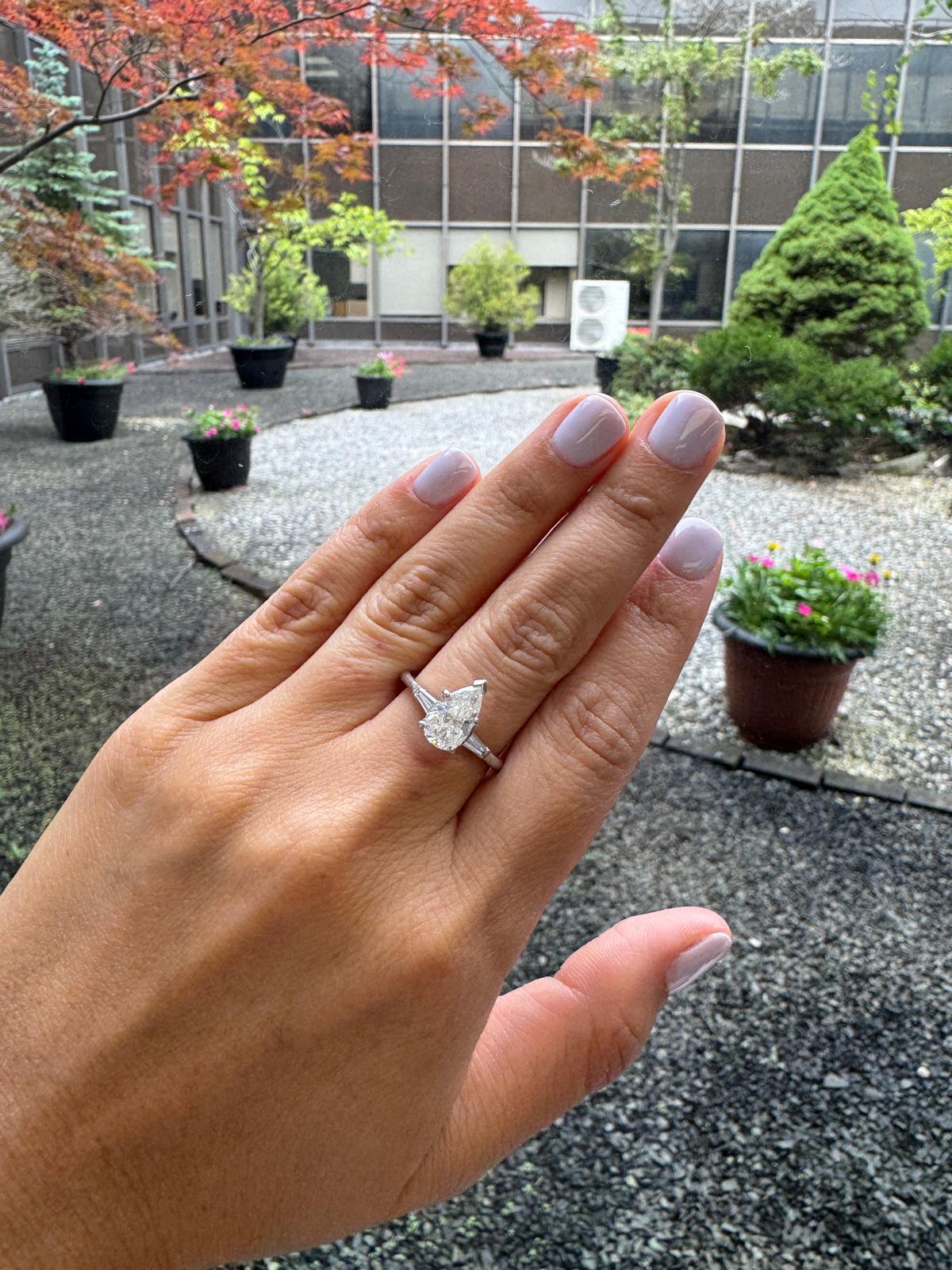 Platinum Ring with 1.60 Carat Pear-Shaped Diamond and Baguette Accents For Sale 7