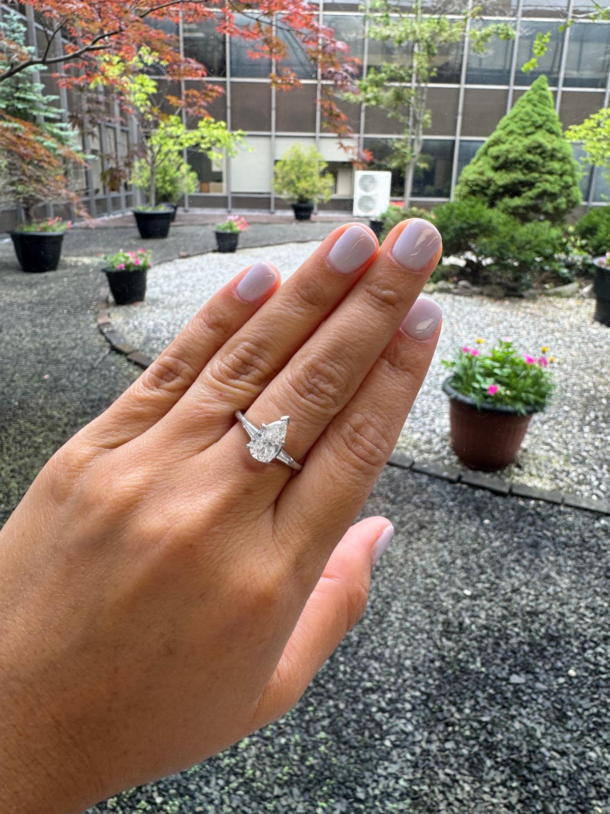 Platinum Ring with 1.60 Carat Pear-Shaped Diamond and Baguette Accents For Sale 8