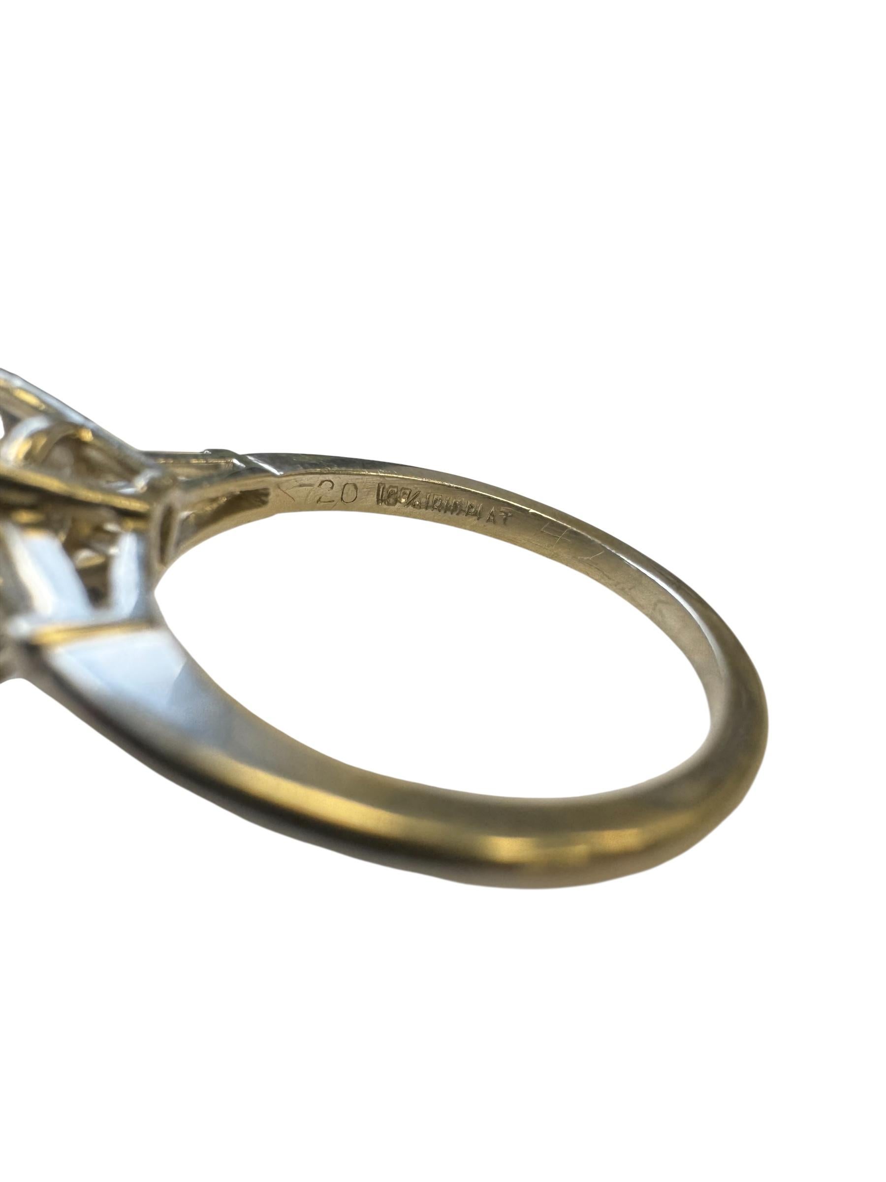 Platinum Ring with 1.60 Carat Pear-Shaped Diamond and Baguette Accents In Excellent Condition For Sale In Great Neck Plaza, NY