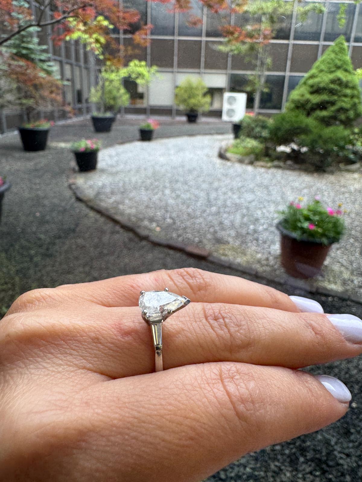Platinum Ring with 1.60 Carat Pear-Shaped Diamond and Baguette Accents For Sale 3