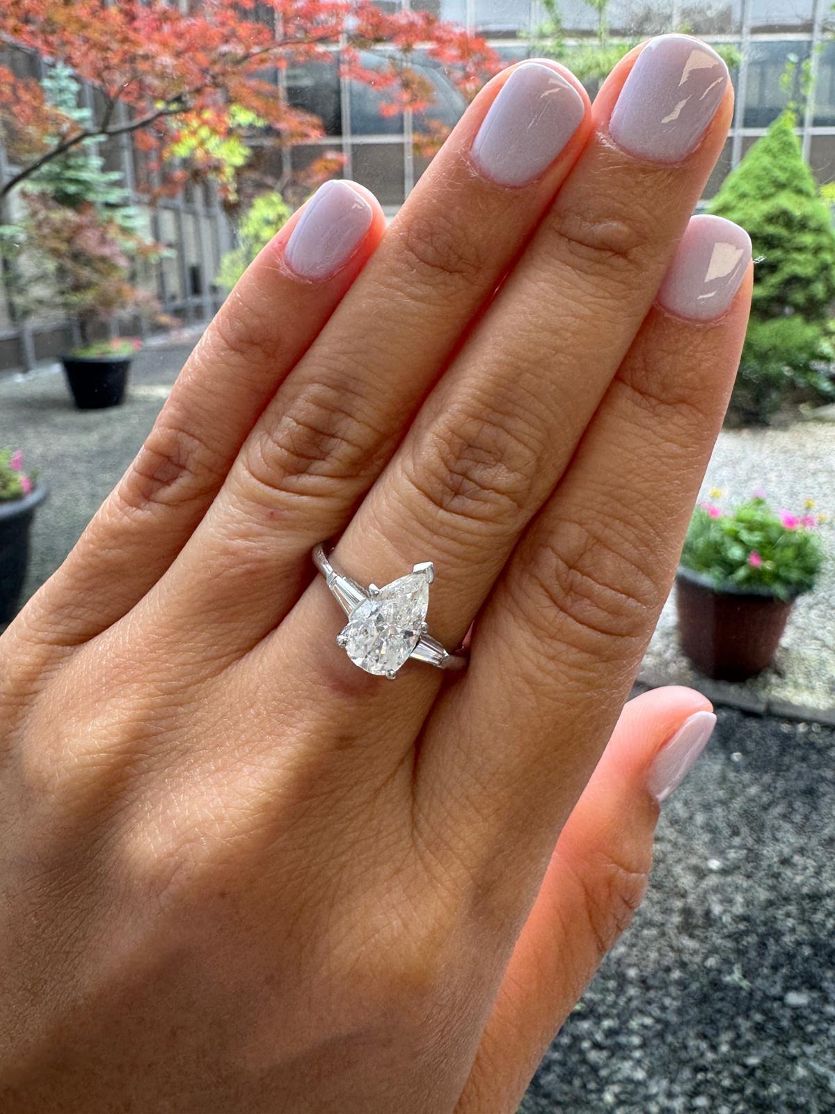 Platinum Ring with 1.60 Carat Pear-Shaped Diamond and Baguette Accents For Sale 4