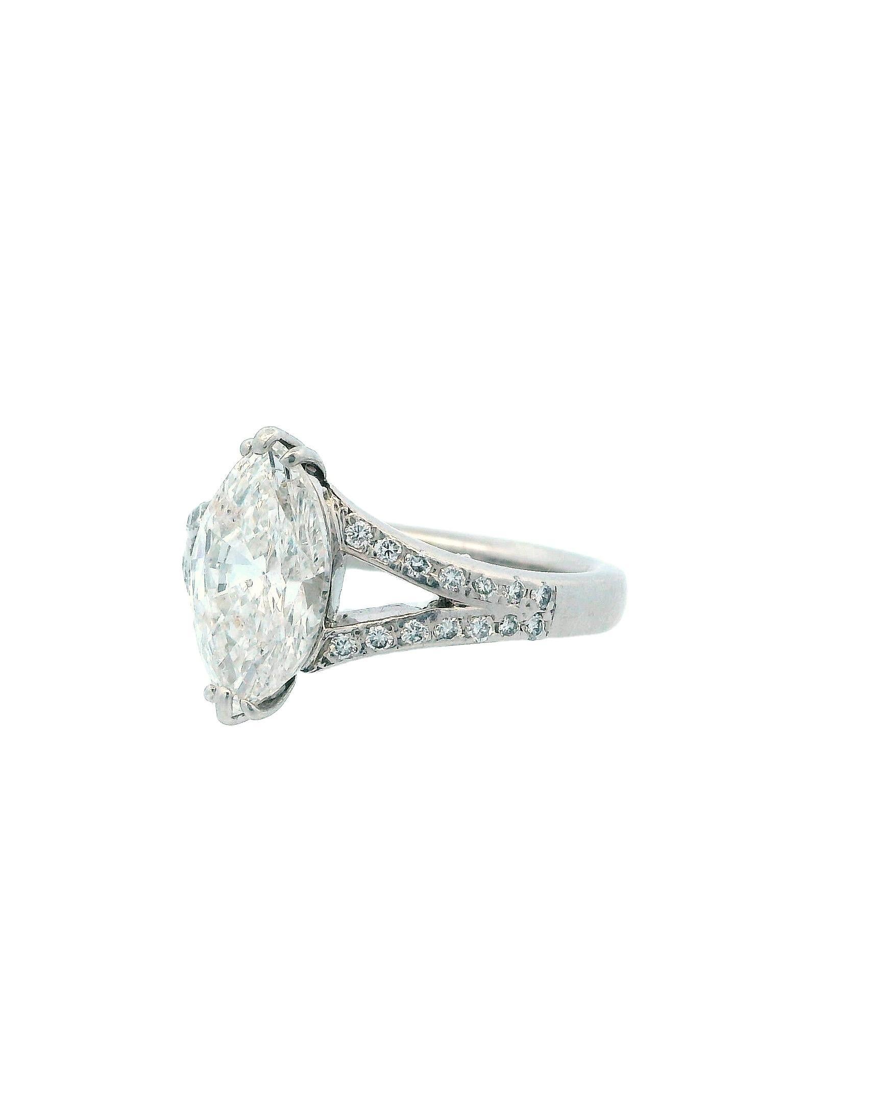 This platinum ring features a stunning 2.50-carat diamond, making it a beautiful piece of fine jewelry for women. The marquise-shaped natural white/colorless diamond has a clarity grade of Included (I1) and a color grade of H, which gives it an