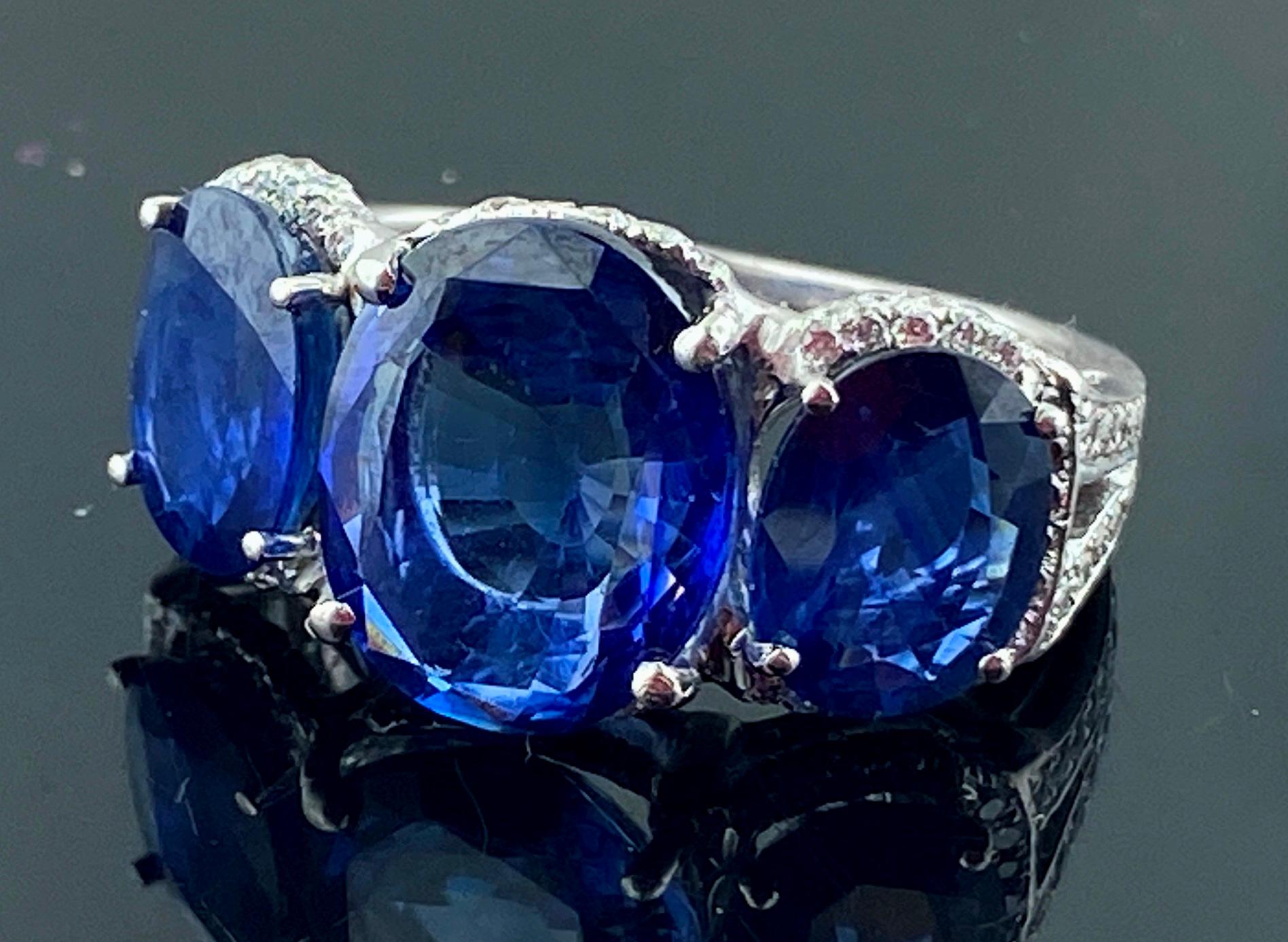Platinum Ring with 3 Large Oval Cut Blue Sapphires and Diamonds 10