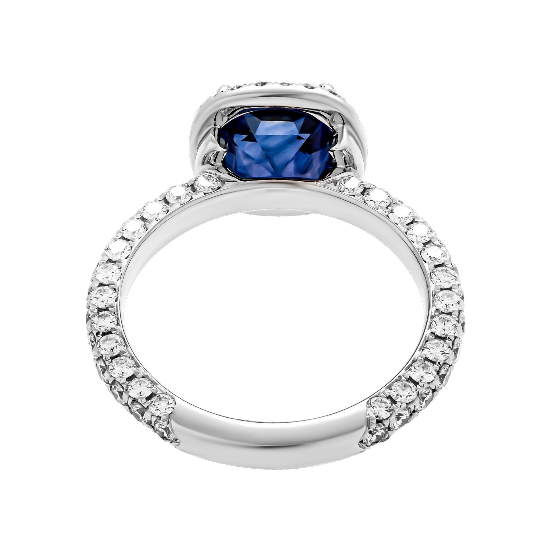Ring in Platinum 
With 3 row diamond shank & classic halo with 3.08ct Cushion Sapphire
 Pave Total Carat Weight: 0.81ct 
Size: 6