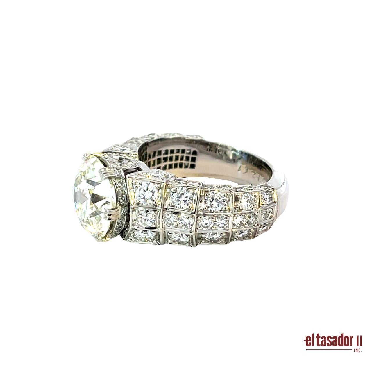 Art Deco Platinum Ring with 4.05 Carat Round Brilliant Diamond and 2.61 Carats of Accents For Sale