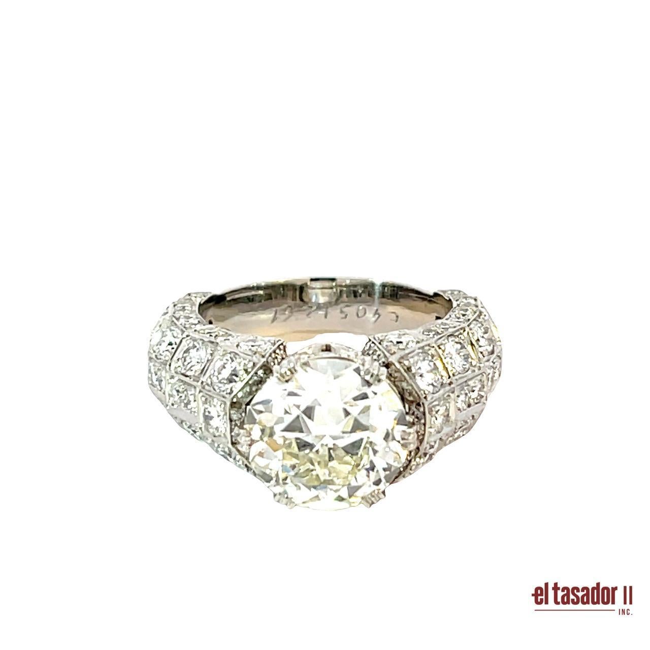 Brilliant Cut Platinum Ring with 4.05 Carat Round Brilliant Diamond and 2.61 Carats of Accents For Sale