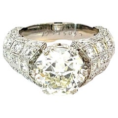 Platinum Ring with 4.05 Carat Round Brilliant Diamond and 2.61 Carats of Accents