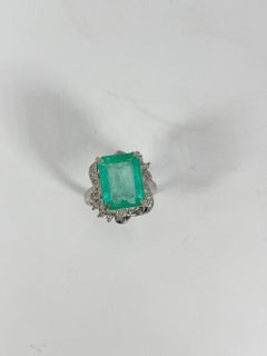 Platinum Ring with 5.00 Ct Emerald and .32 CTW Diamonds