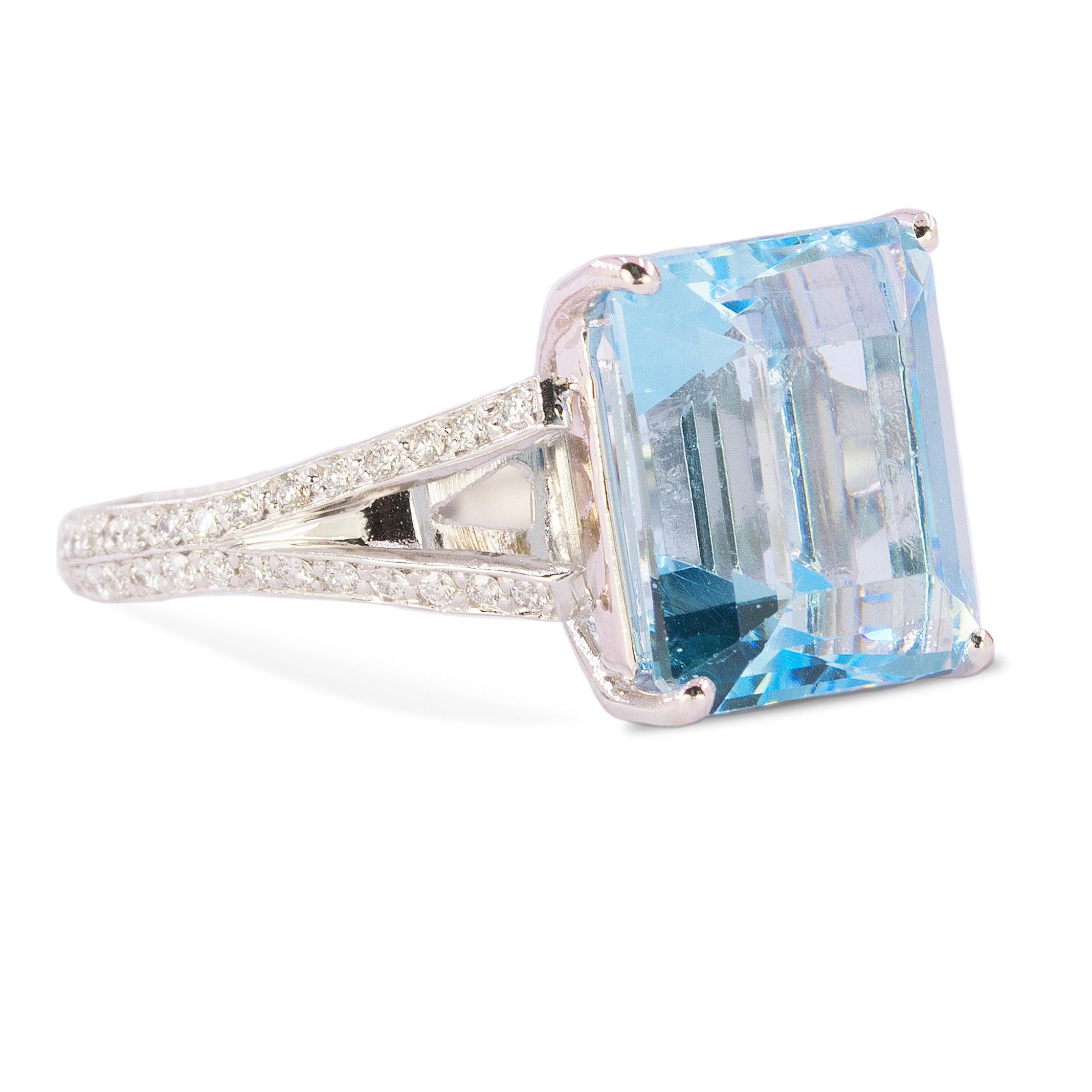 Platinum Ring with one 8.73 carat emerald cut Aquamarine and 56 round brilliant diamonds weighing 0.84 carats. 
