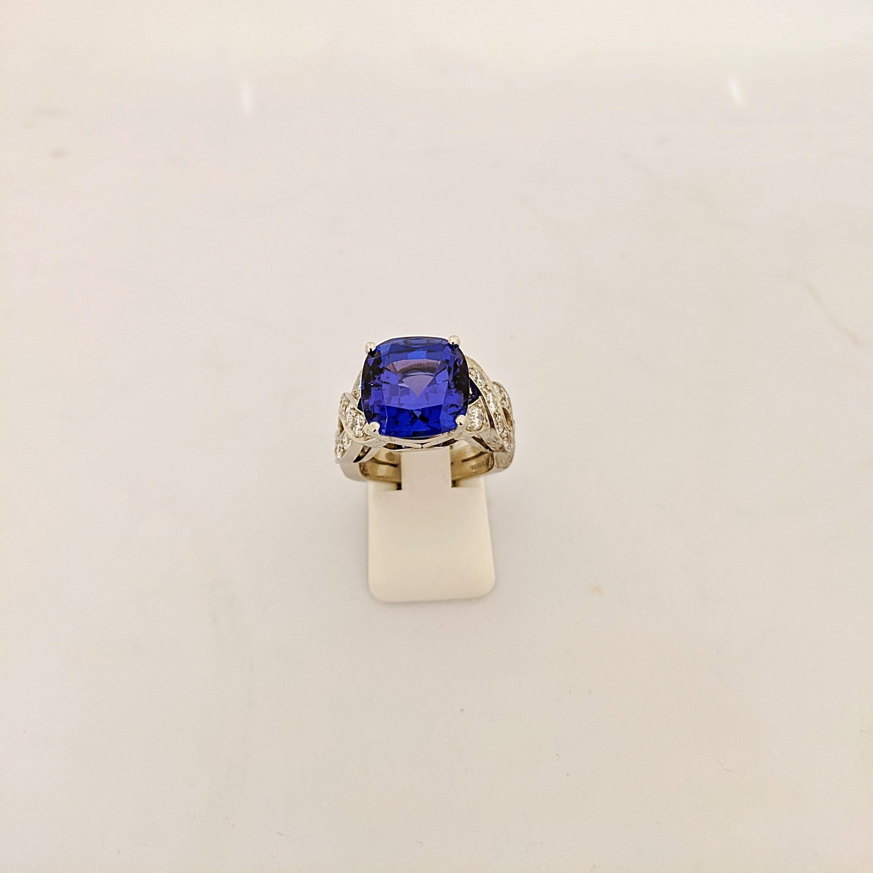 Modern Platinum Ring with 9.65 Carat Cushion Cut Tanzanite Center and Diamond Setting For Sale