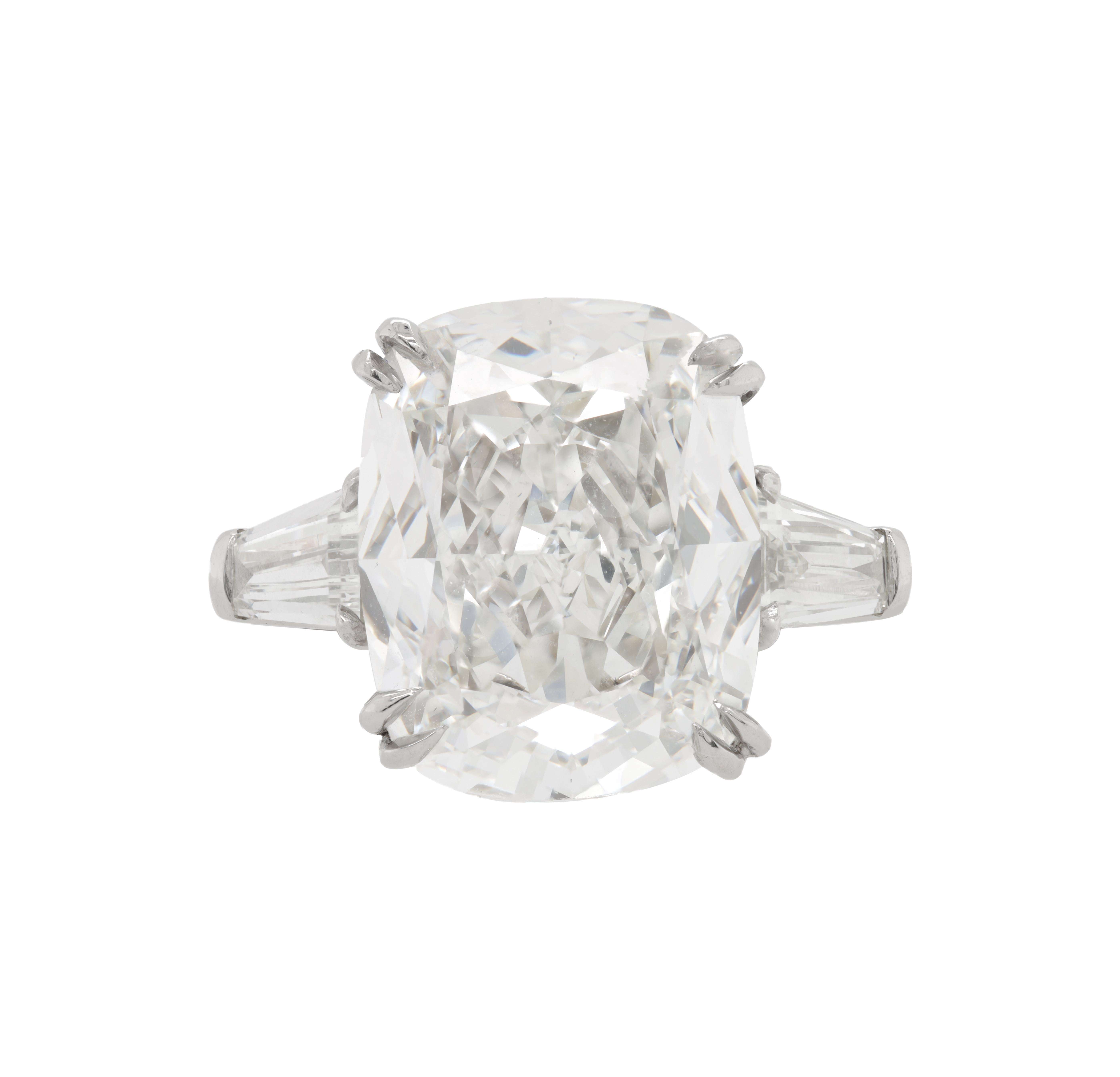 Platinum diamond ring with center cushion diamond 10.02ct h vs2 GIA (radc1085) with 2 trillions on side .92ct total 
