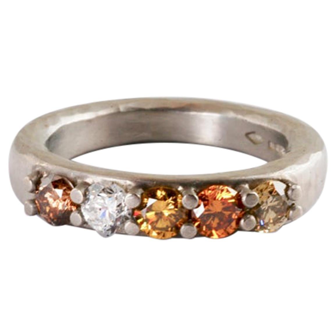 Platinum claw set Natural Coloured diamond Ring 0.88 Carat For Sale