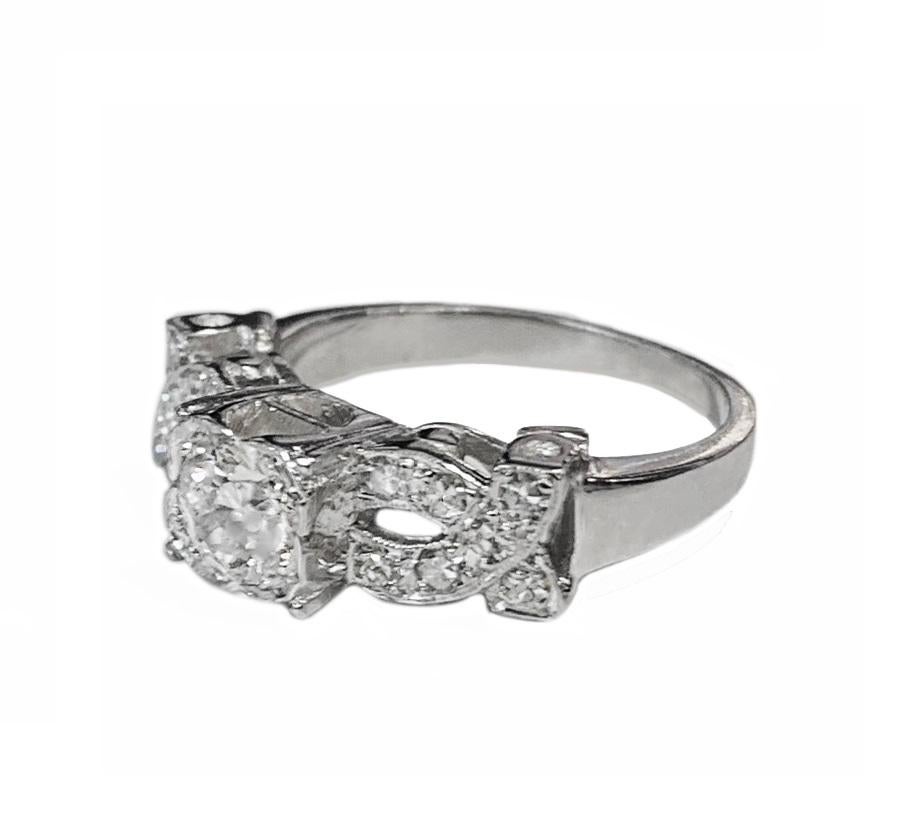 Platinum Ring With Diamonds 0.7ct Center Stone In New Condition For Sale In New York, NY