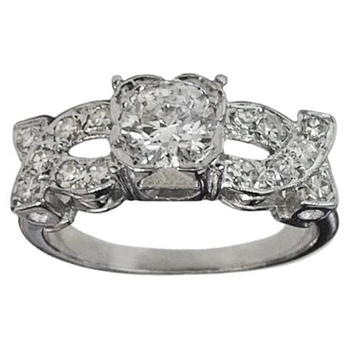 Platinum Ring With Diamonds 0.7ct Center Stone For Sale