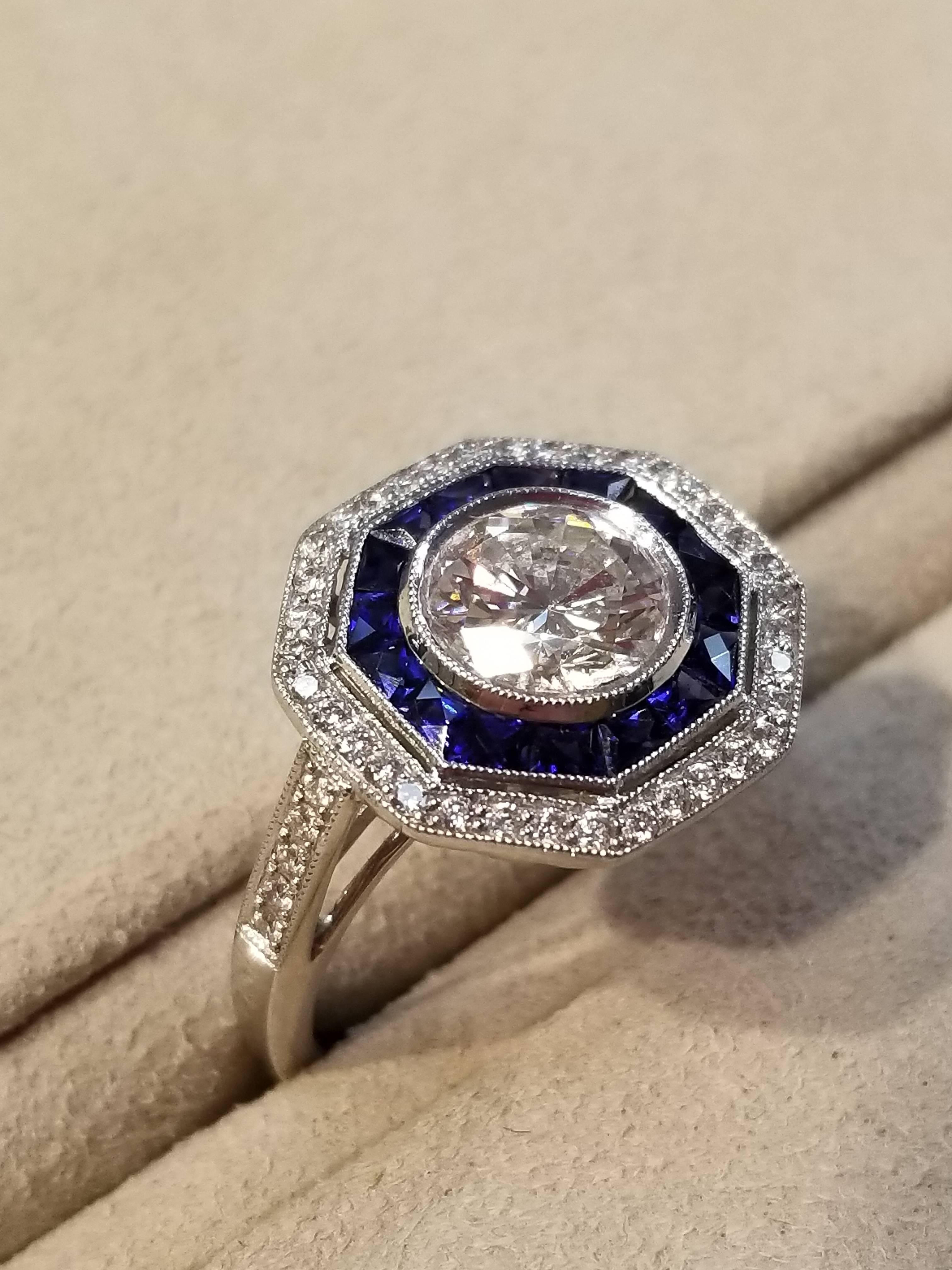 Modern Platinum Ring with Diamonds and Sapphires For Sale