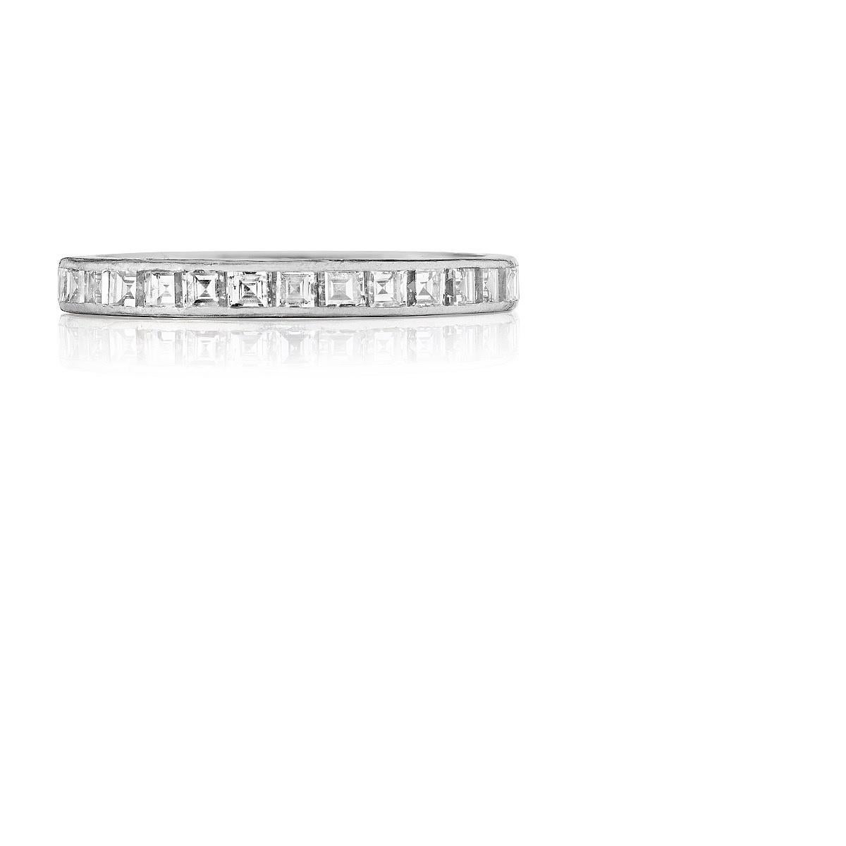 A platinum ring with diamonds by Tiffany & Co. This band has 32 Asscher cut diamonds with an approximate total weight of 3.20 carats. They have a G/H color and VS clarity grade. Circa 1970's.

Signed, 