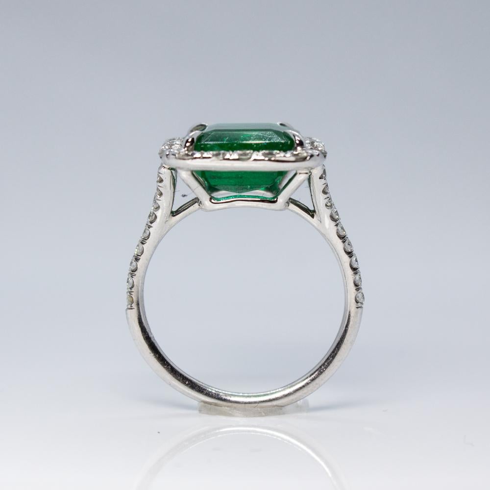 Women's Platinum Ring with Emerald Cut Emerald and Diamond Accents For Sale