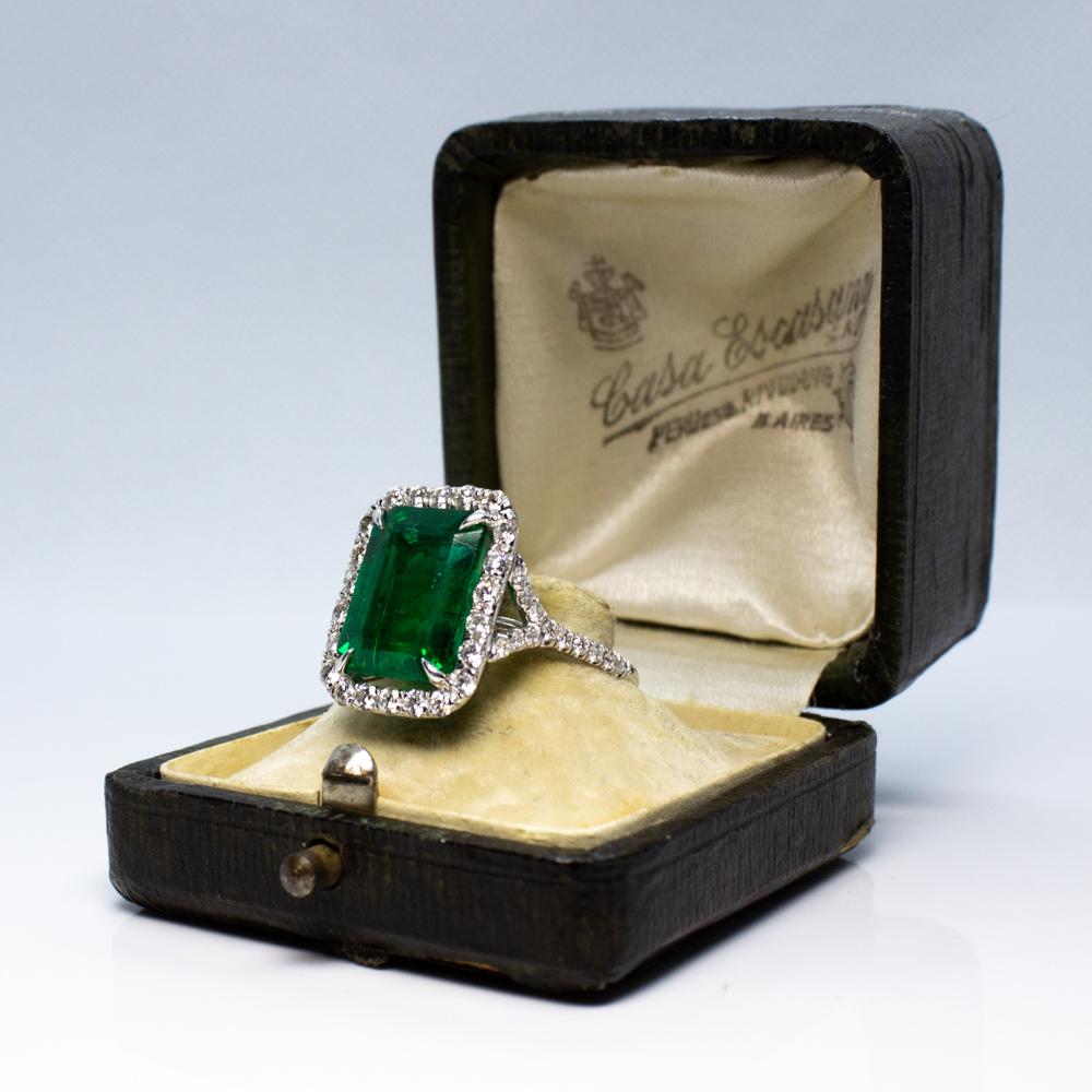 Platinum Ring with Emerald Cut Emerald and Diamond Accents For Sale 1