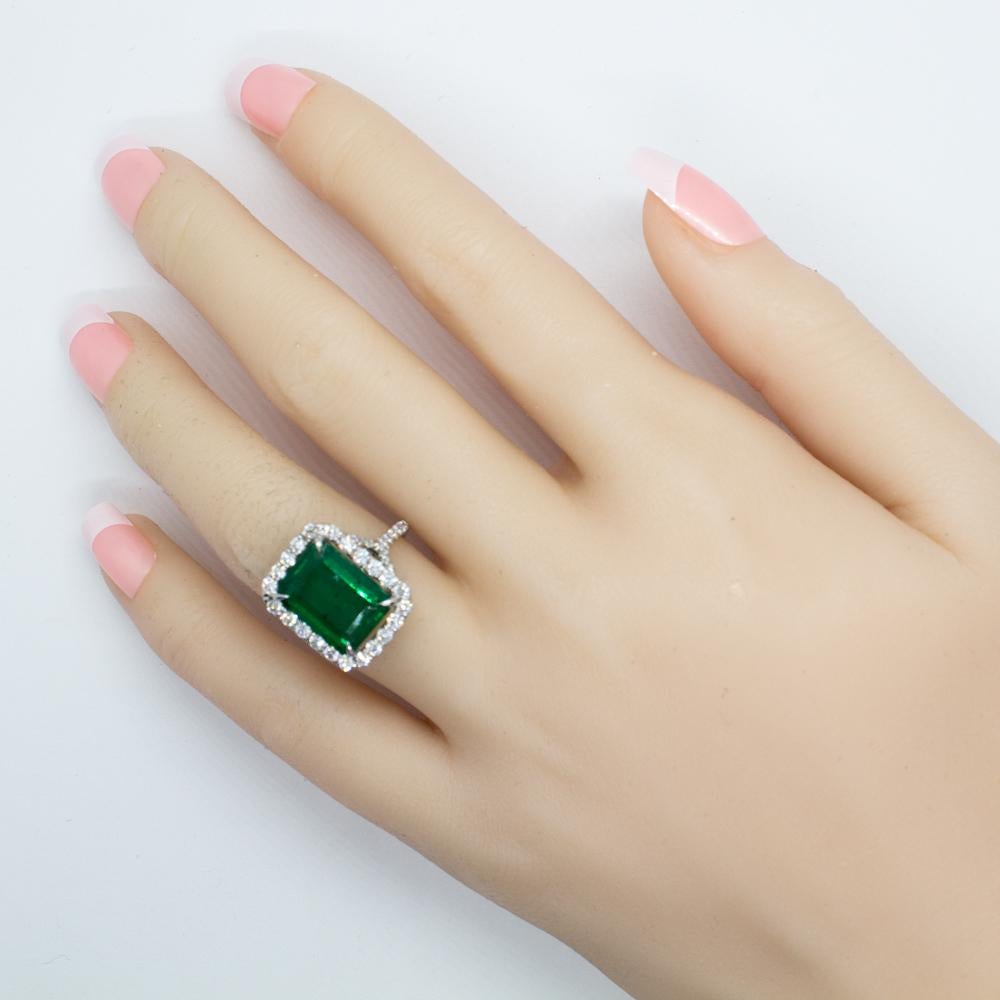 Platinum Ring with Emerald Cut Emerald and Diamond Accents For Sale 2