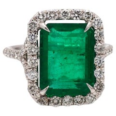 Platinum Ring with Emerald Cut Emerald and Diamond Accents
