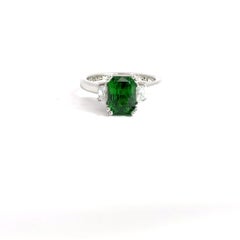 Platinum Ring with GIA-Certified Tsavorite and Trillion-Cut Diamonds