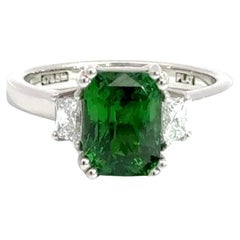 Platinum Ring with GIA-Certified Tsavorite and Trillion-Cut Diamonds