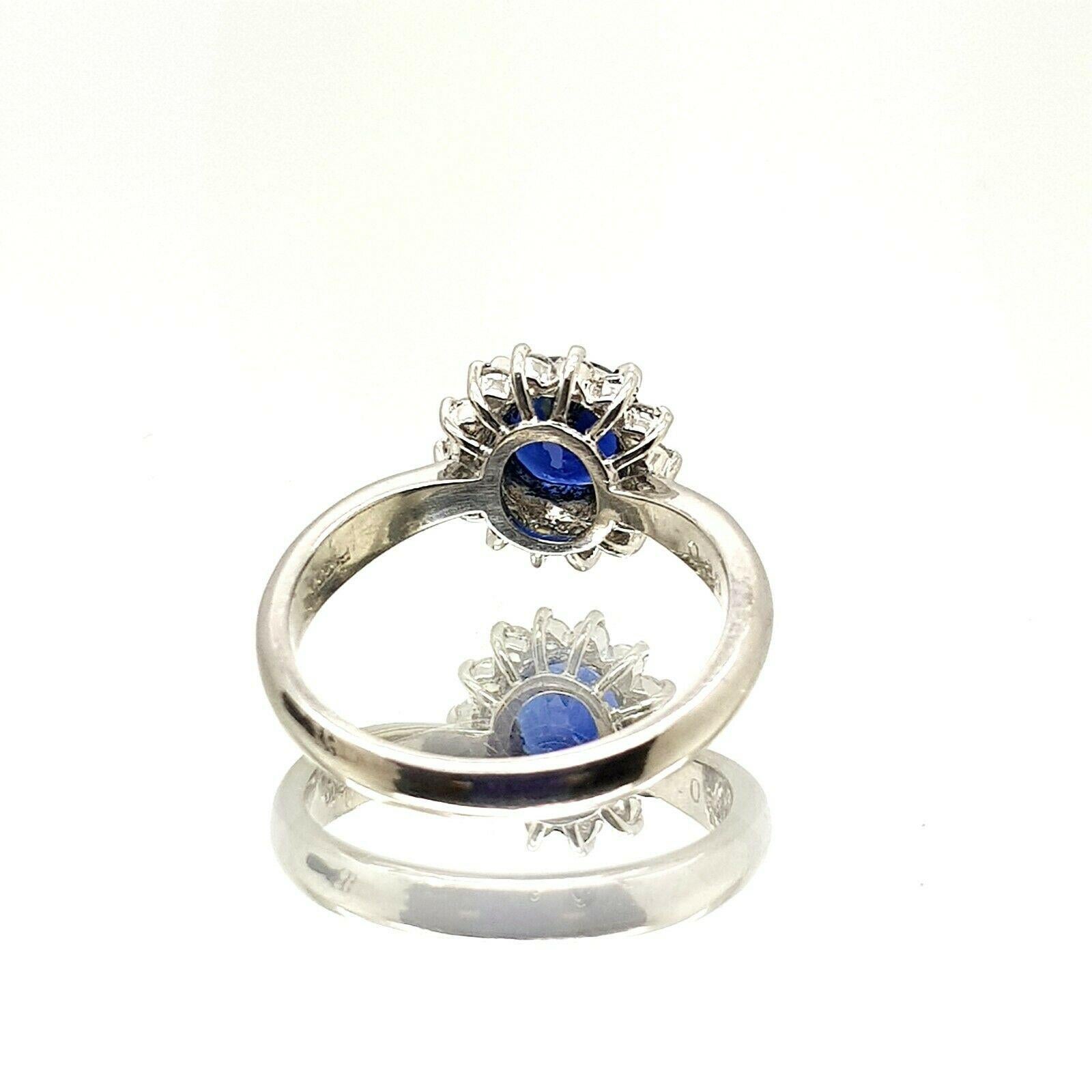  This is beautiful platinum ring with nice intense blue sapphire and diamonds. Looks very elegant on the hand. The current ring size is 5US, but it can be resized. 
Specifications:
    main stone: BLUE SAPPHIRE  0.88 ct
    additional: ROUND