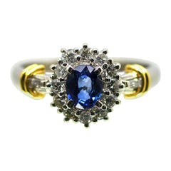 Platinum Ring with Nice Intense Blue Sapphire and Diamonds Yellow Gold