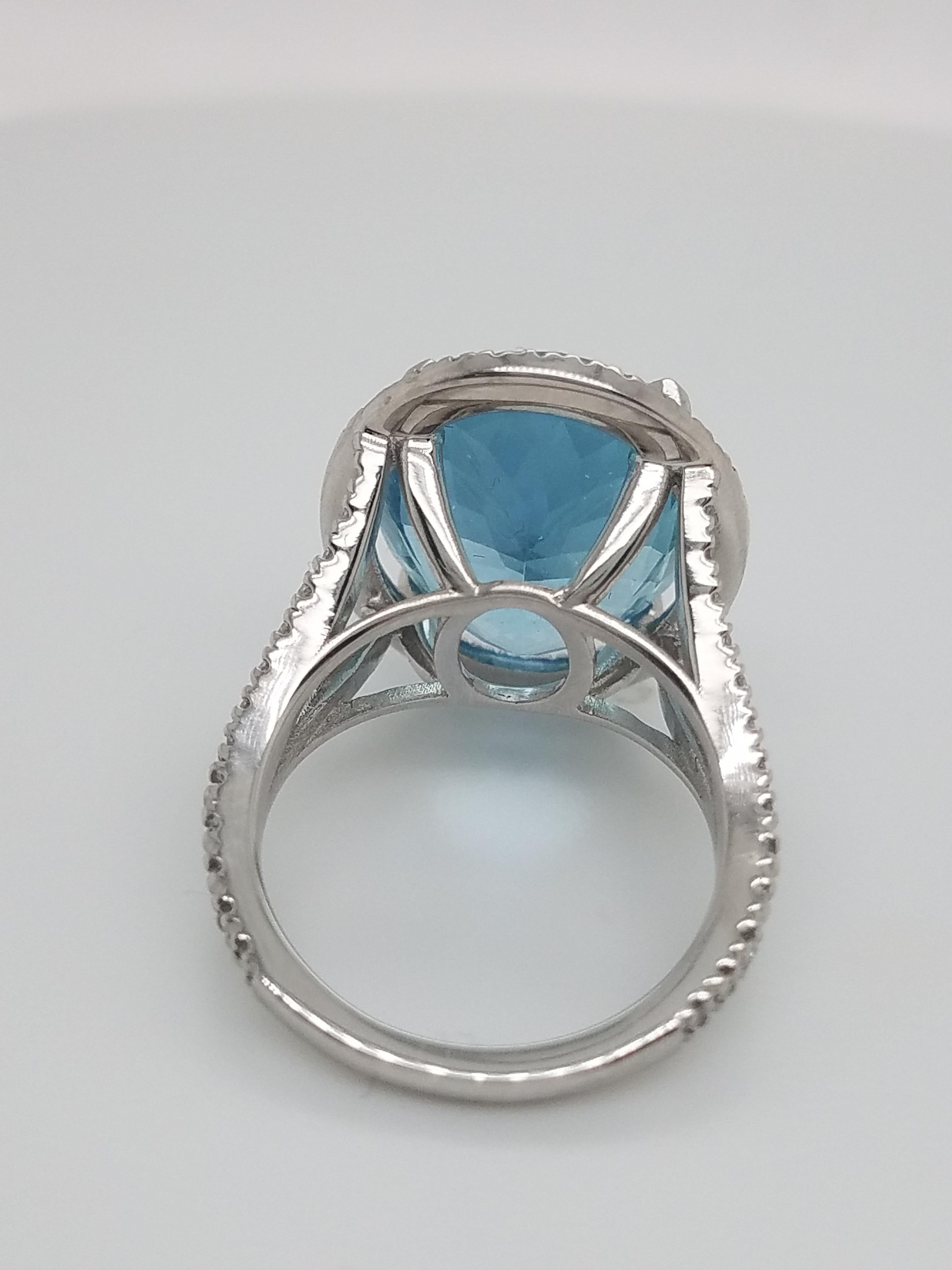 Platinum Ring with Oval Aquamarine That Weights 10.87 Cts and Halo Diamond Ring For Sale 1