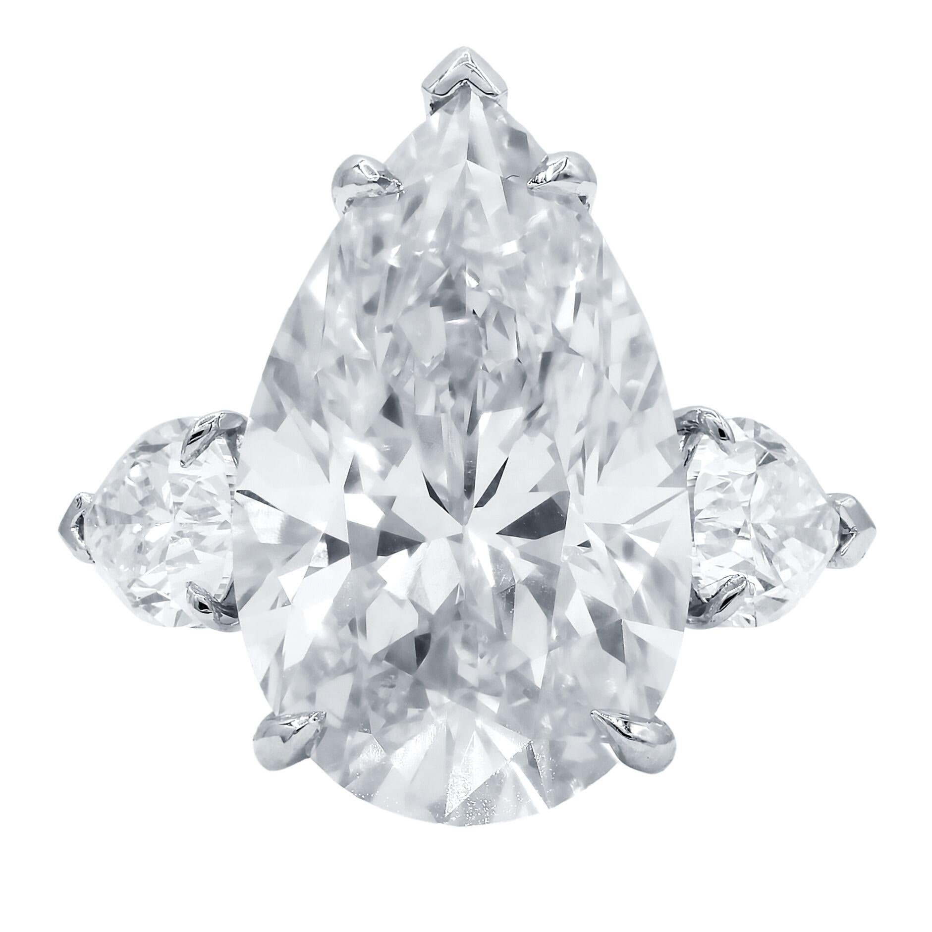 Platinum pear shape diamond ring with GIA certified pear shape (psc297) 10.87ct j-vs2 diamond set with 2.00ct of two pear GIA certified diamonds. (psc302; psc303)
